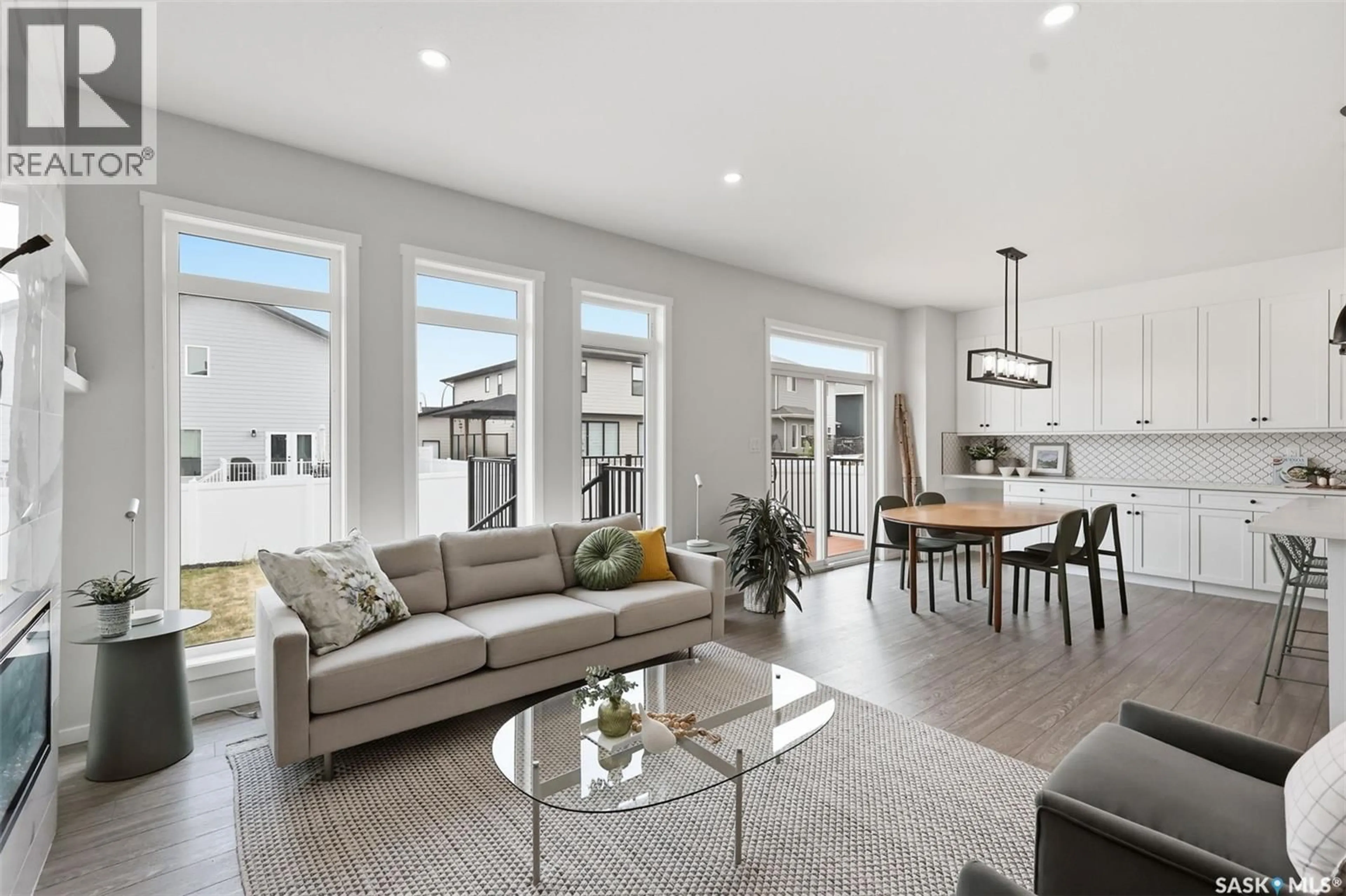 Living room with furniture, unknown for 446 ANISKOTAW WAY, Saskatoon Saskatchewan S7V1M3