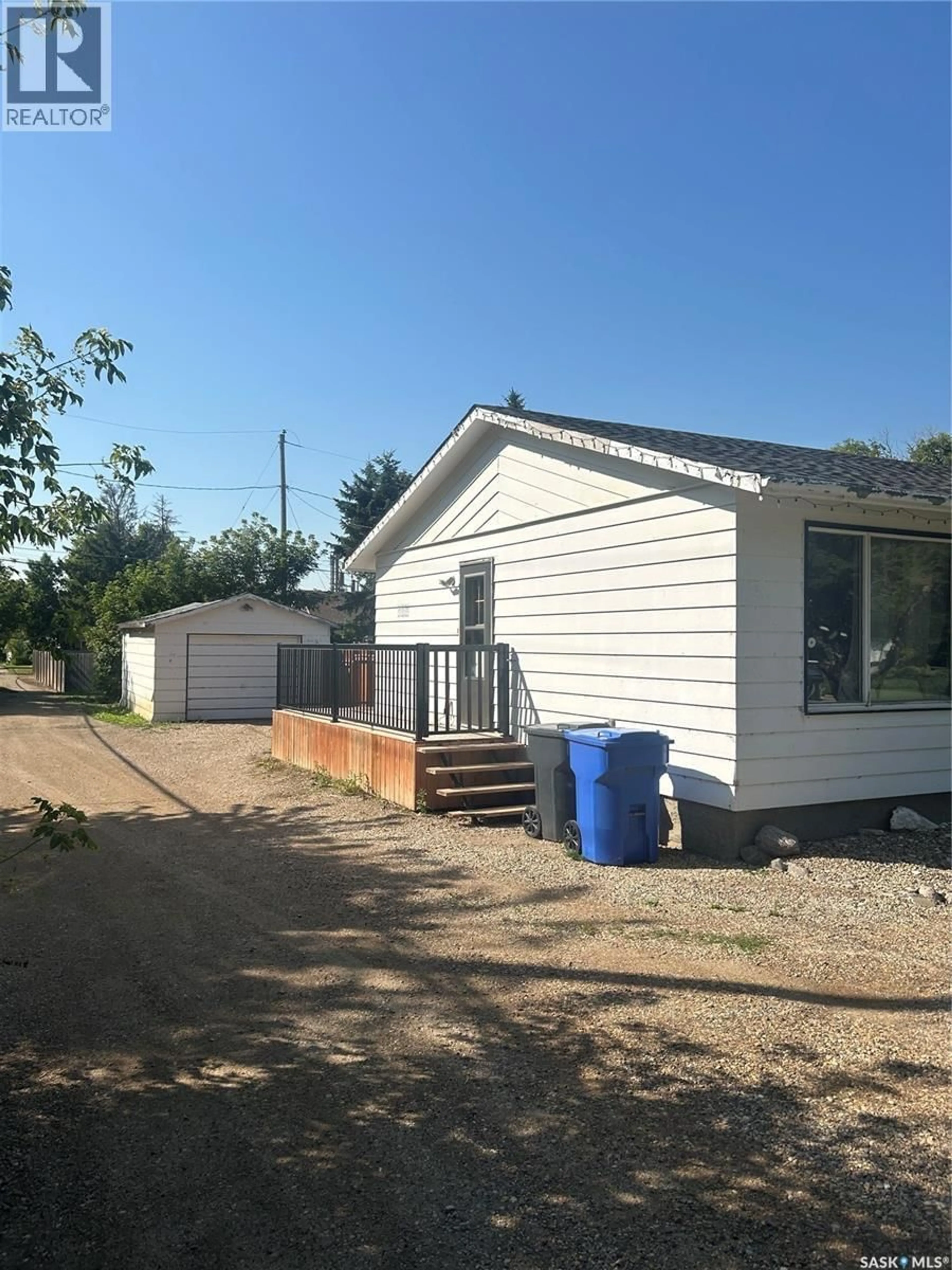 Home with vinyl exterior material, street for 230 WALLACE STREET, Kamsack Saskatchewan S0A1S0