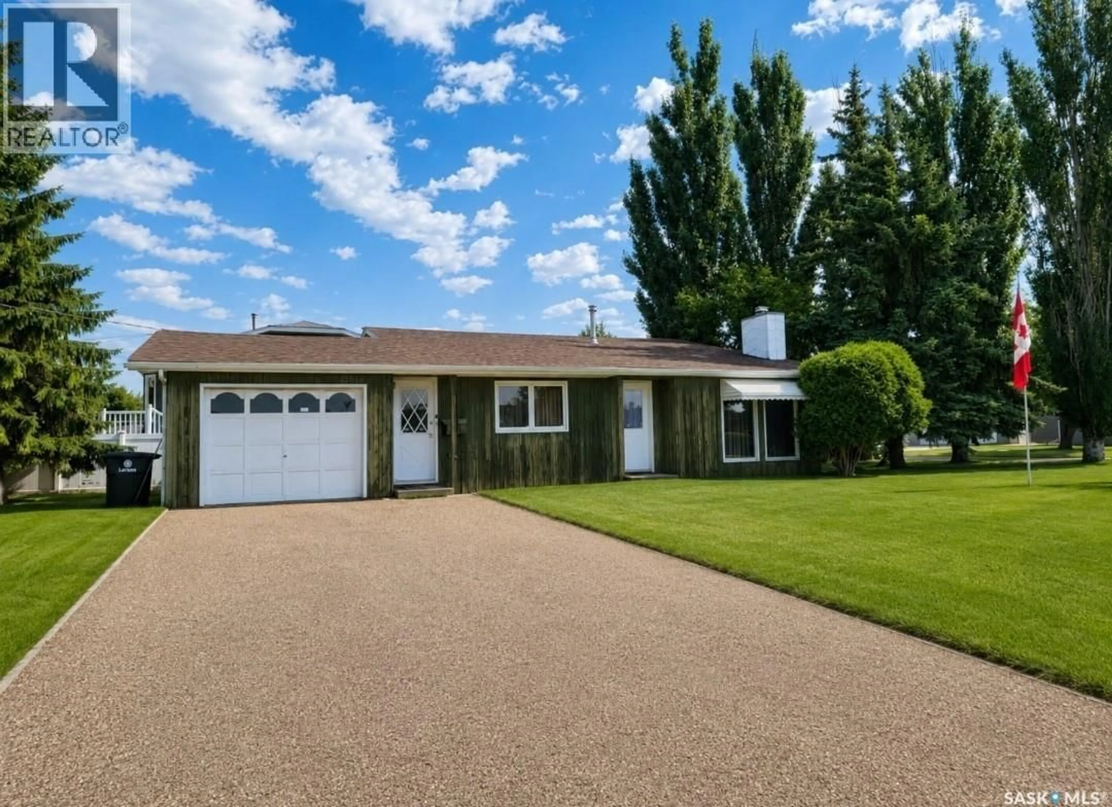 Home with vinyl exterior material, street for 509 3RD STREET, Wilkie Saskatchewan S0K4W0