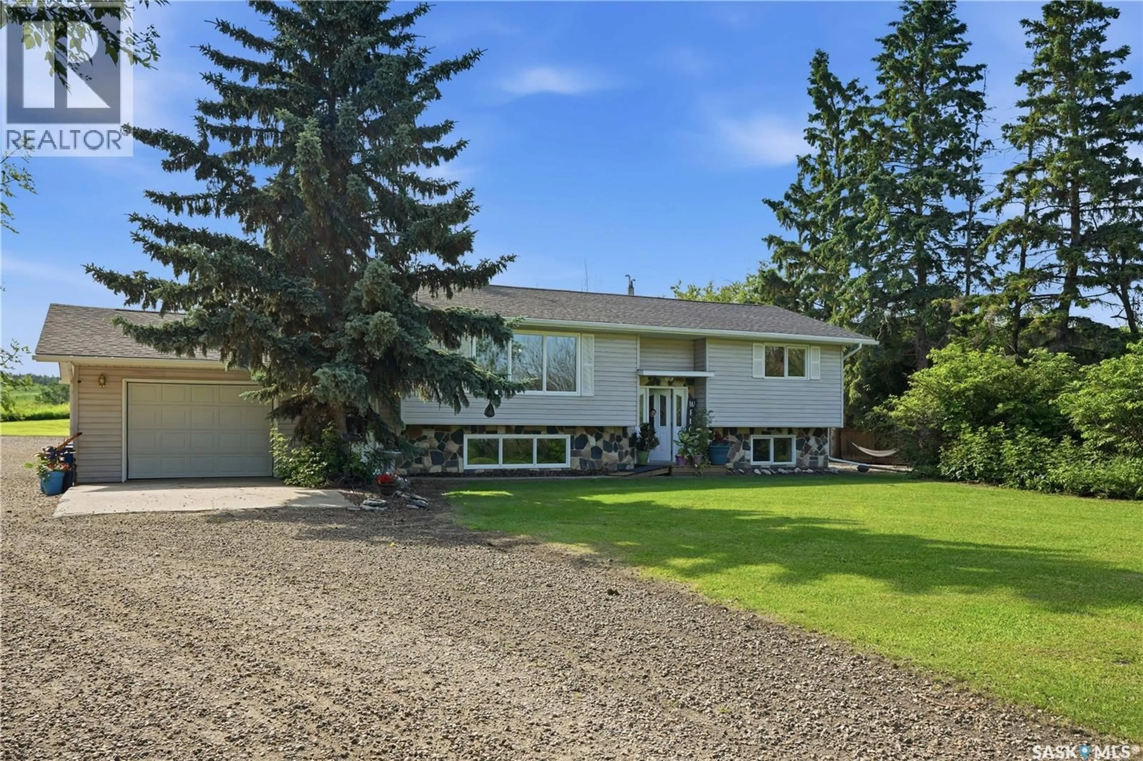 A pic from outside/outdoor area/front of a property/back of a property/a pic from drone, street for THORHAUG ACREAGE, Leask Rm No. 464 Saskatchewan S0J1M0