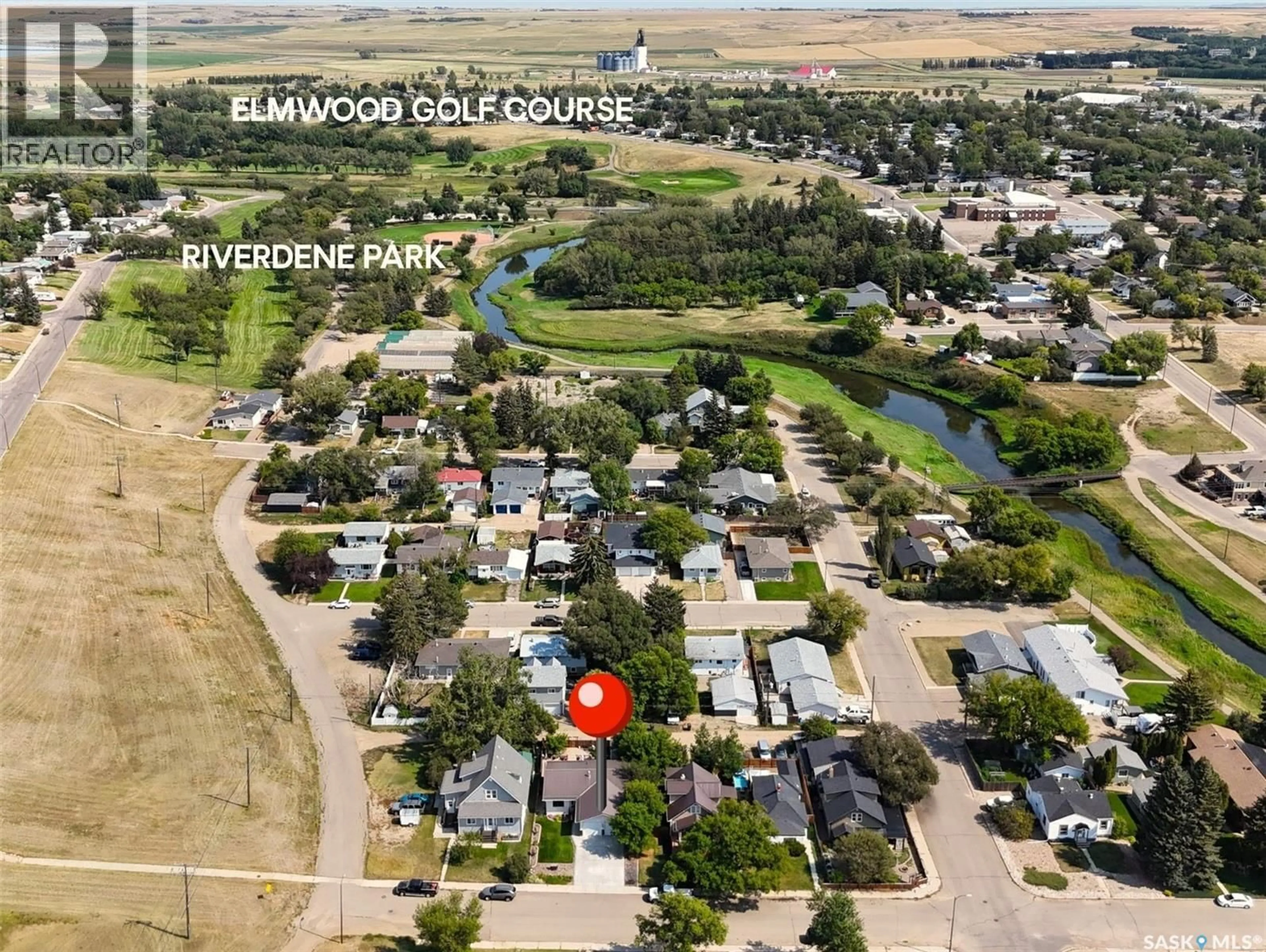 A pic from outside/outdoor area/front of a property/back of a property/a pic from drone, water/lake/river/ocean view for 625 7TH AVENUE, Swift Current Saskatchewan S9H2N8