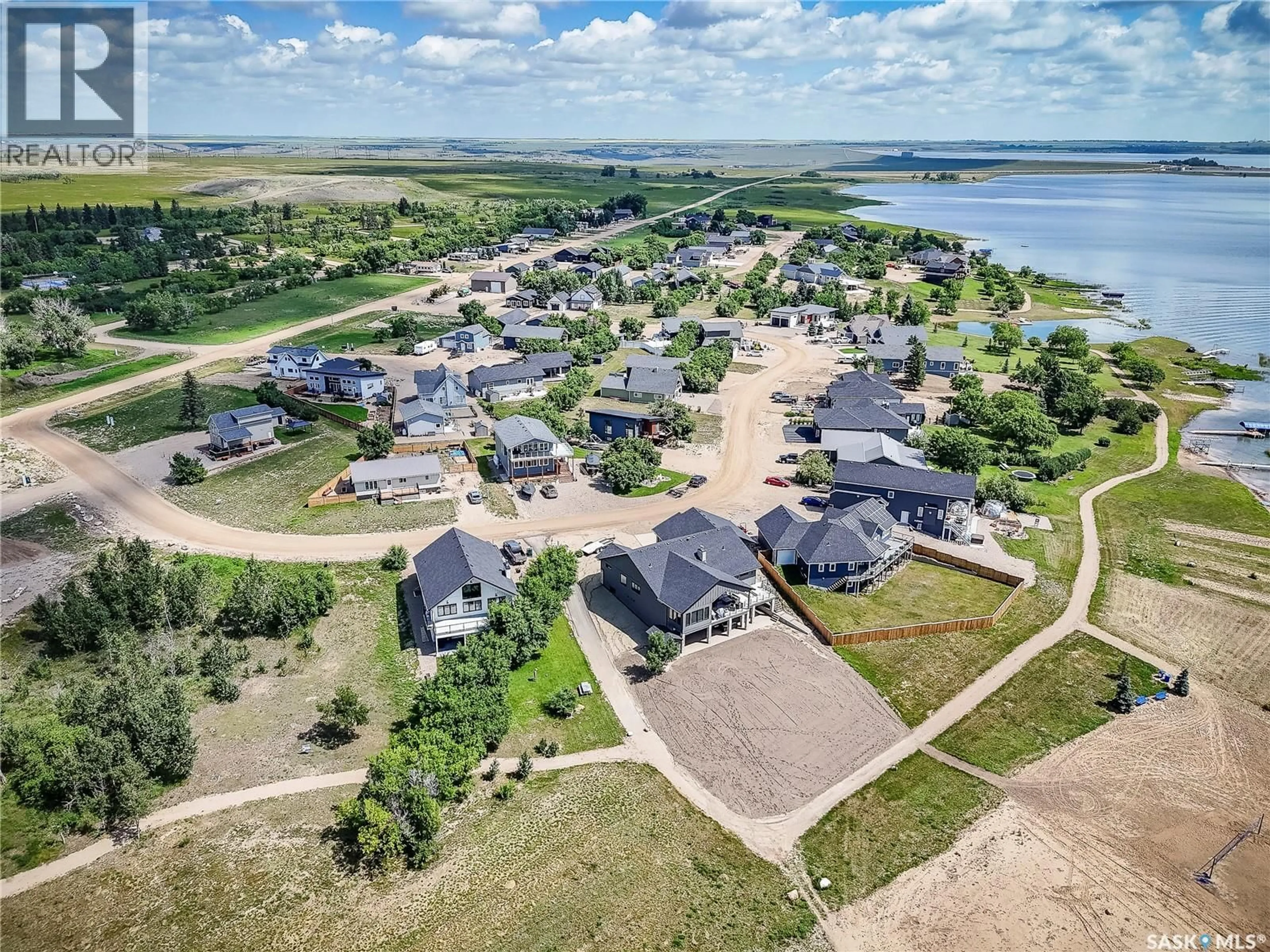 A pic from outside/outdoor area/front of a property/back of a property/a pic from drone, water/lake/river/ocean view for 27 SANDY ROAD, Diefenbaker Lake Saskatchewan S0L2E0