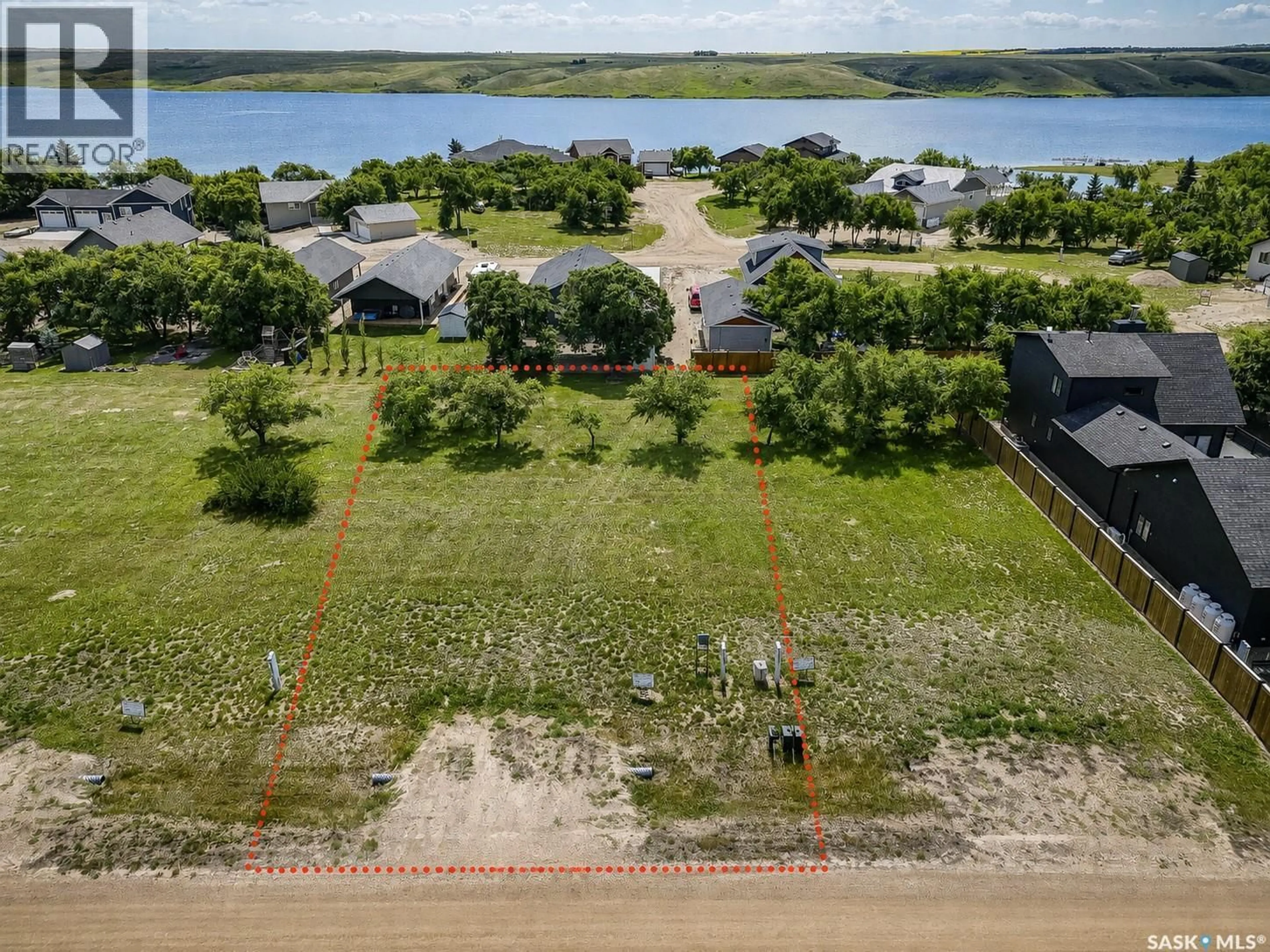 A pic from outside/outdoor area/front of a property/back of a property/a pic from drone, water/lake/river/ocean view for 27 SANDY ROAD, Diefenbaker Lake Saskatchewan S0L2E0