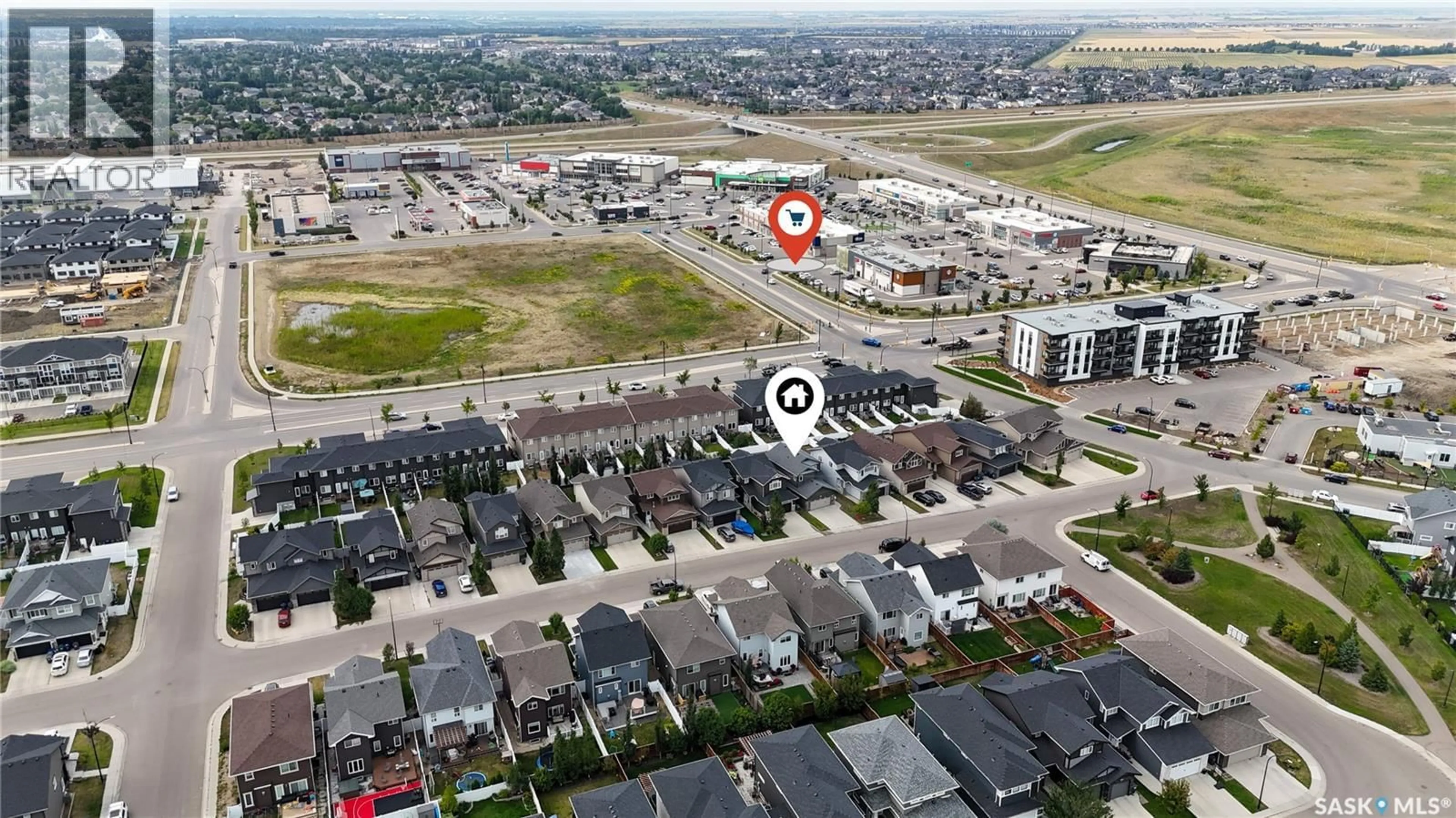 A pic from outside/outdoor area/front of a property/back of a property/a pic from drone, street for 127 DAGNONE LANE, Saskatoon Saskatchewan S7V0P6