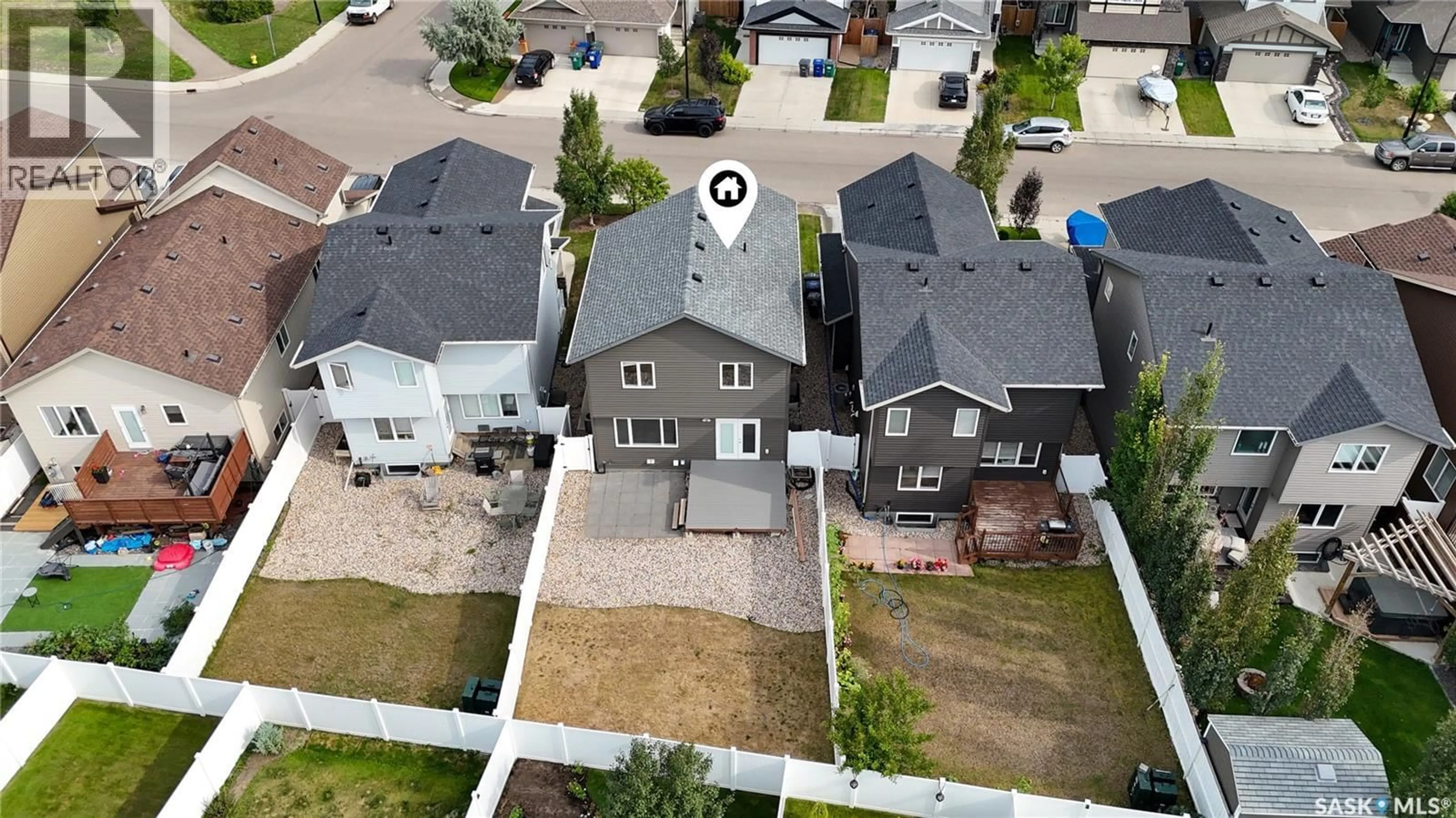 A pic from outside/outdoor area/front of a property/back of a property/a pic from drone, street for 127 DAGNONE LANE, Saskatoon Saskatchewan S7V0P6