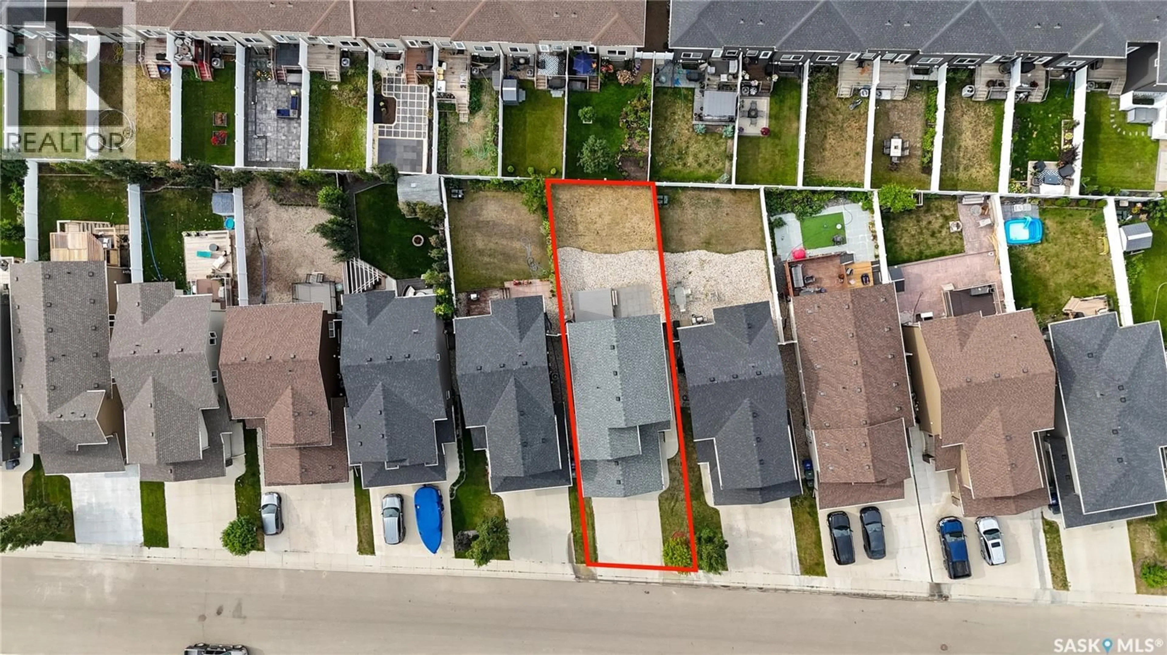A pic from outside/outdoor area/front of a property/back of a property/a pic from drone, street for 127 DAGNONE LANE, Saskatoon Saskatchewan S7V0P6