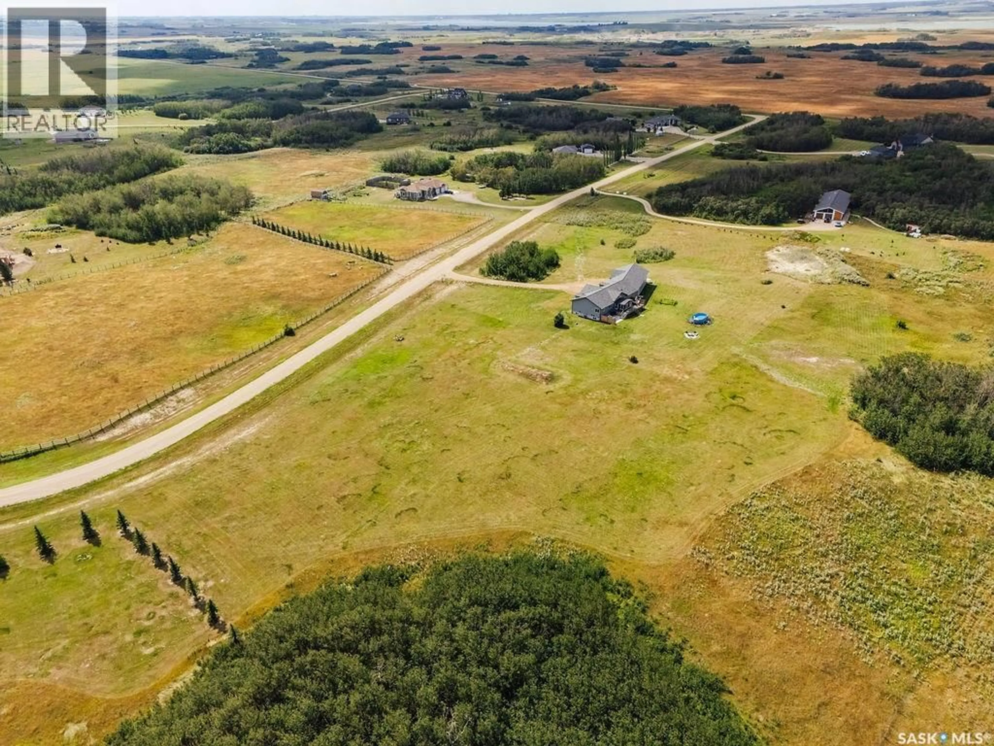A pic from outside/outdoor area/front of a property/back of a property/a pic from drone, unknown for 117 LOUISE CRESCENT, Aberdeen No 373 Saskatchewan S7A0A9