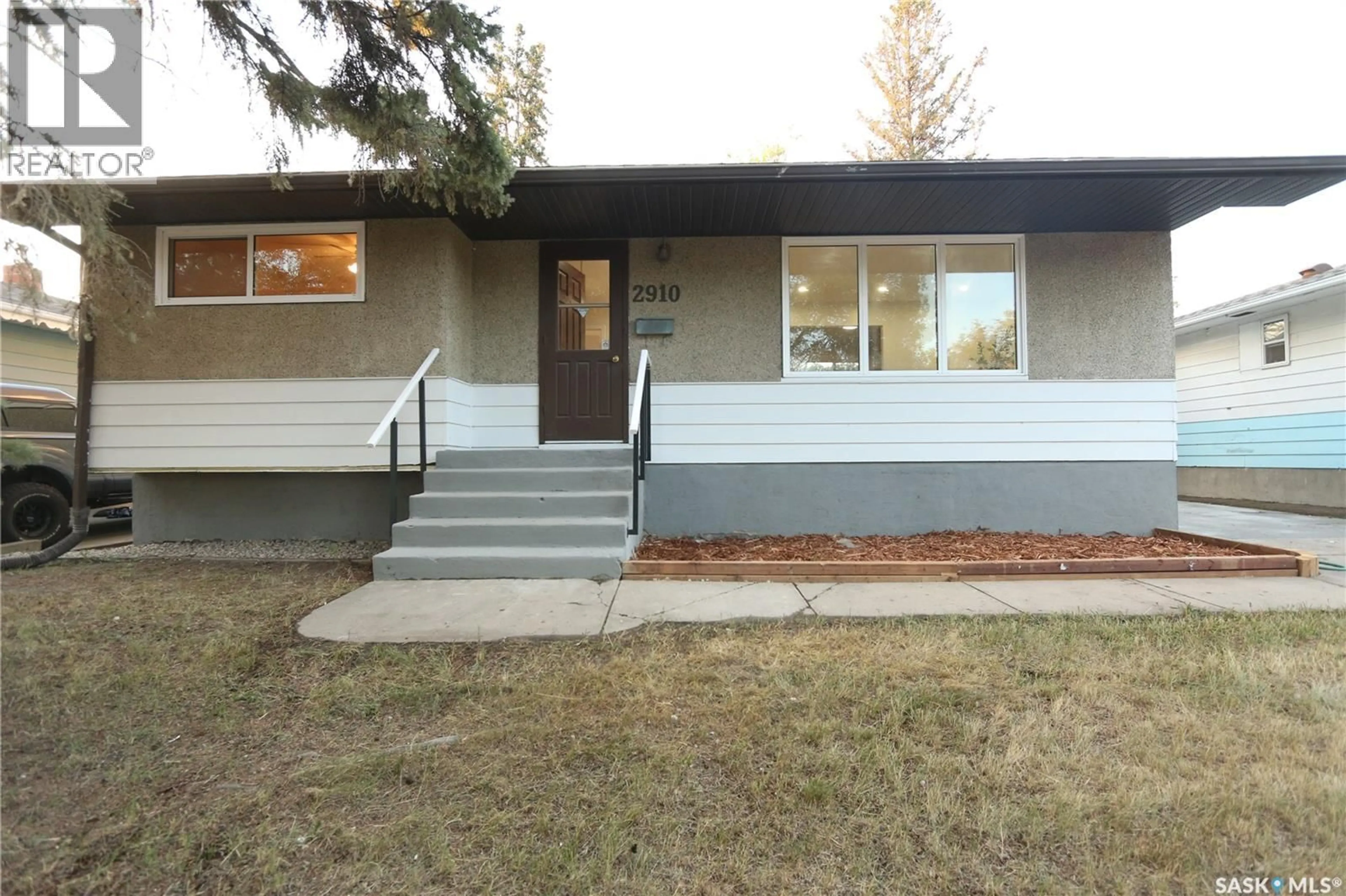 Home with vinyl exterior material, street for 2910 AVONHURST DRIVE, Regina Saskatchewan S4R3J5