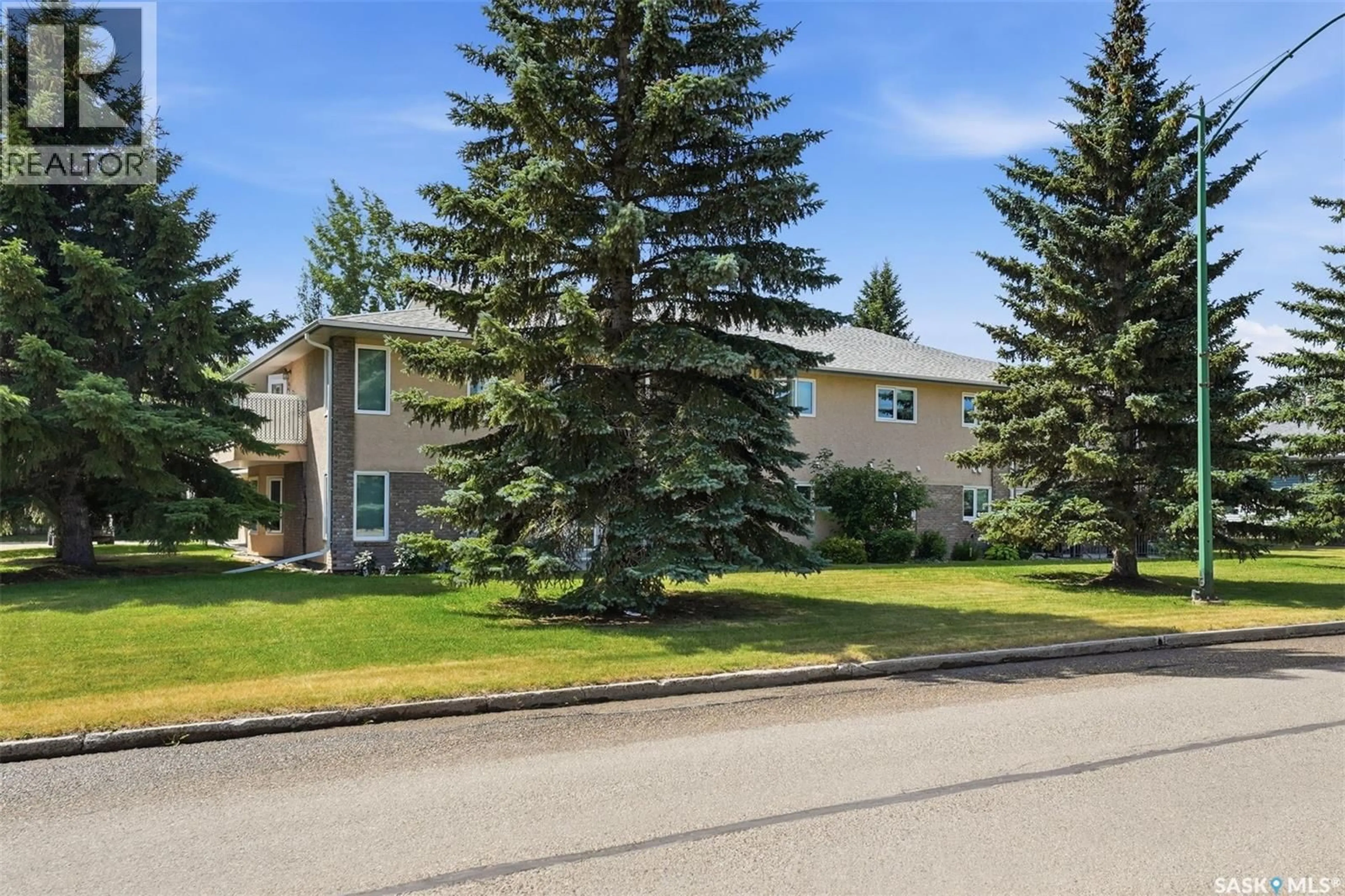 A pic from outside/outdoor area/front of a property/back of a property/a pic from drone, street for #2 - 105 6TH AVENUE, Watrous Saskatchewan S0K4T0