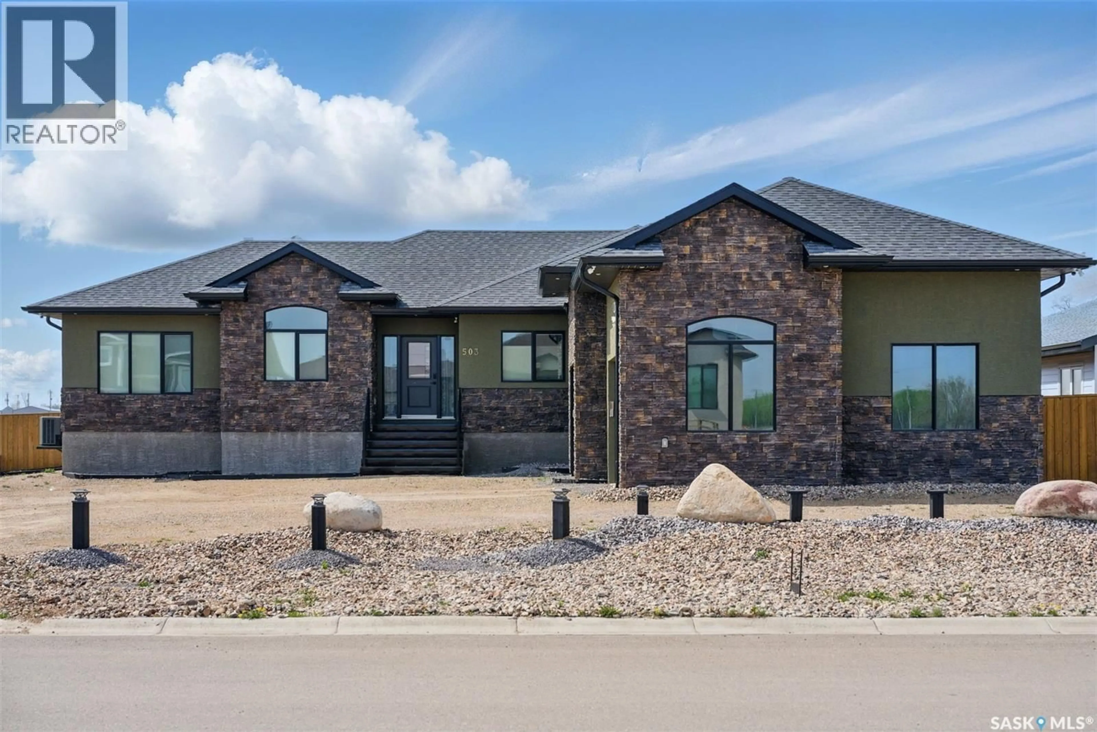 Home with brick exterior material, unknown for 503 8TH AVENUE, Watrous Saskatchewan S0K4T0