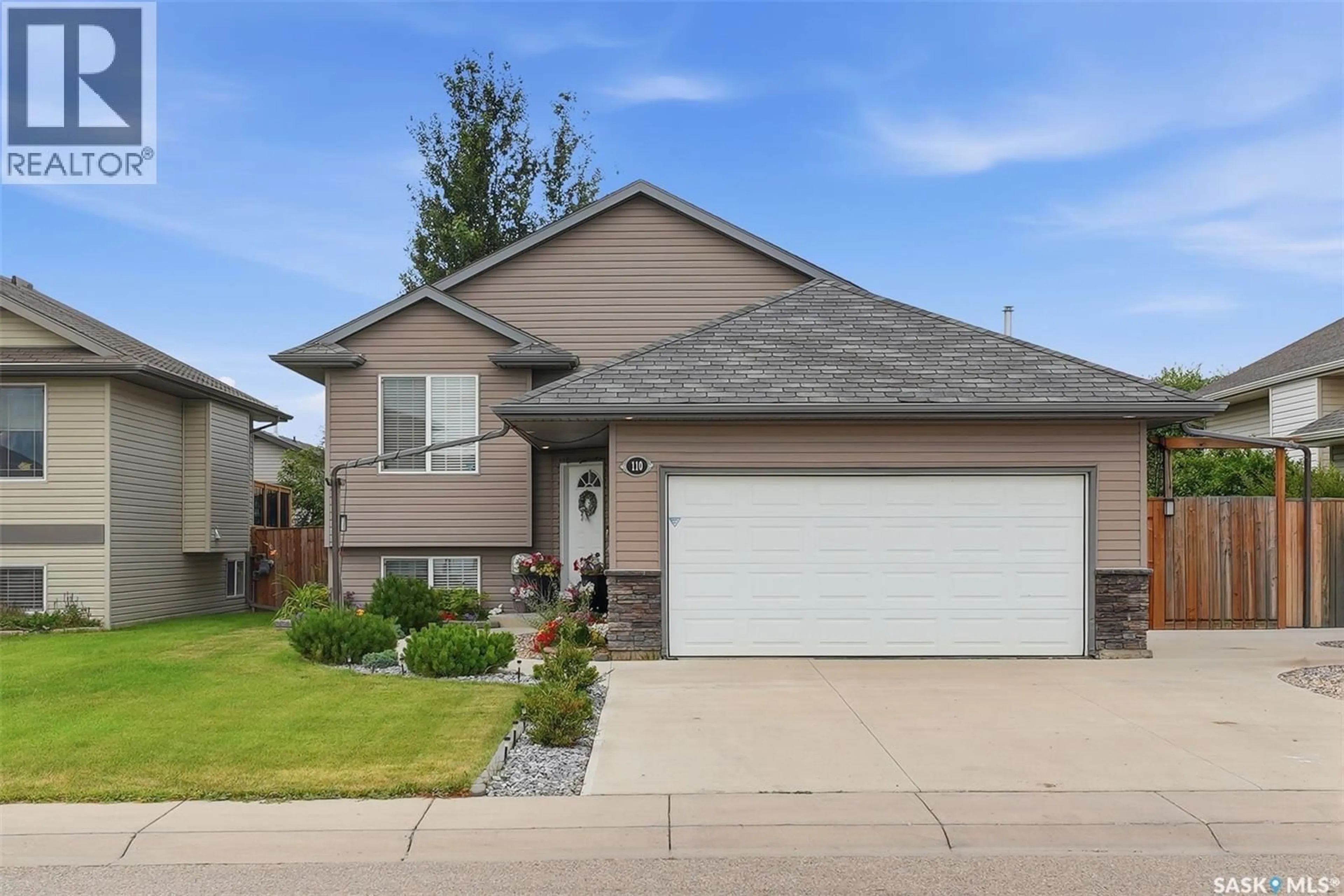 Home with vinyl exterior material, street for 110 BENNION CRESCENT, Saskatoon Saskatchewan S7W0H1