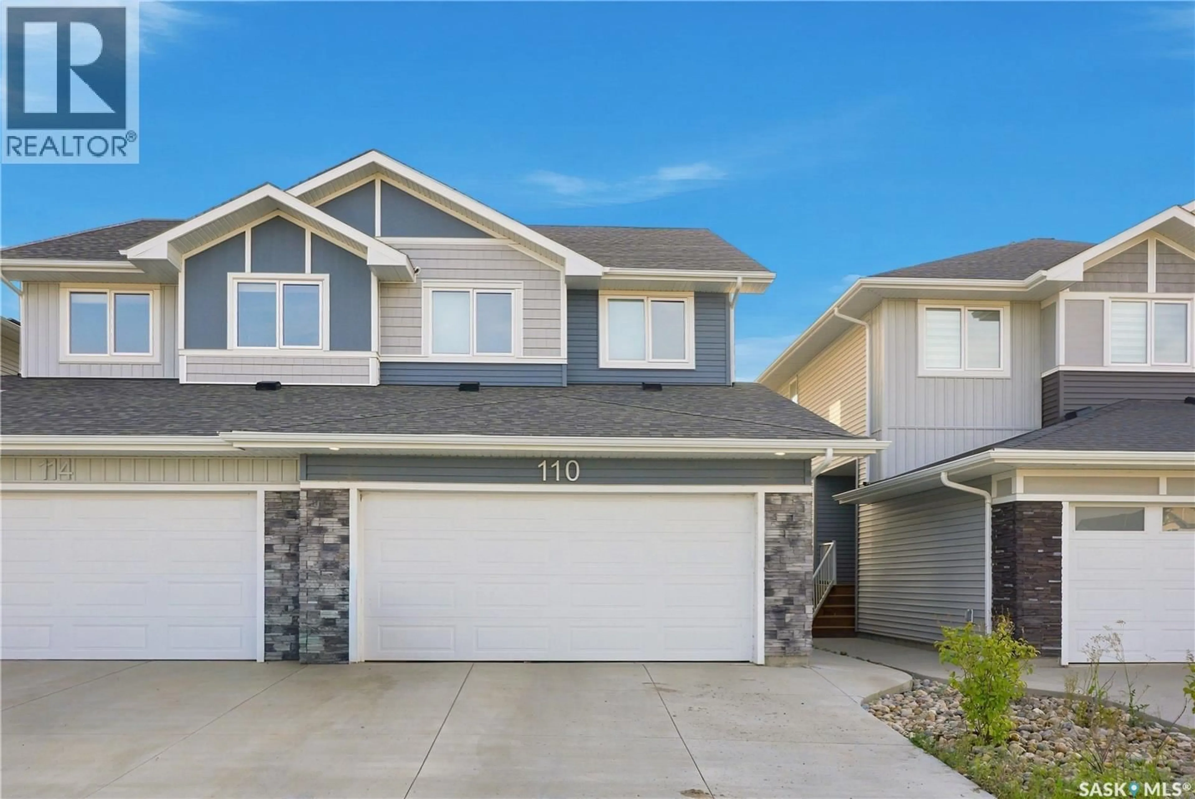 Home with vinyl exterior material, street for 110 COWESSESS ROAD, Saskatoon Saskatchewan S7V1S3