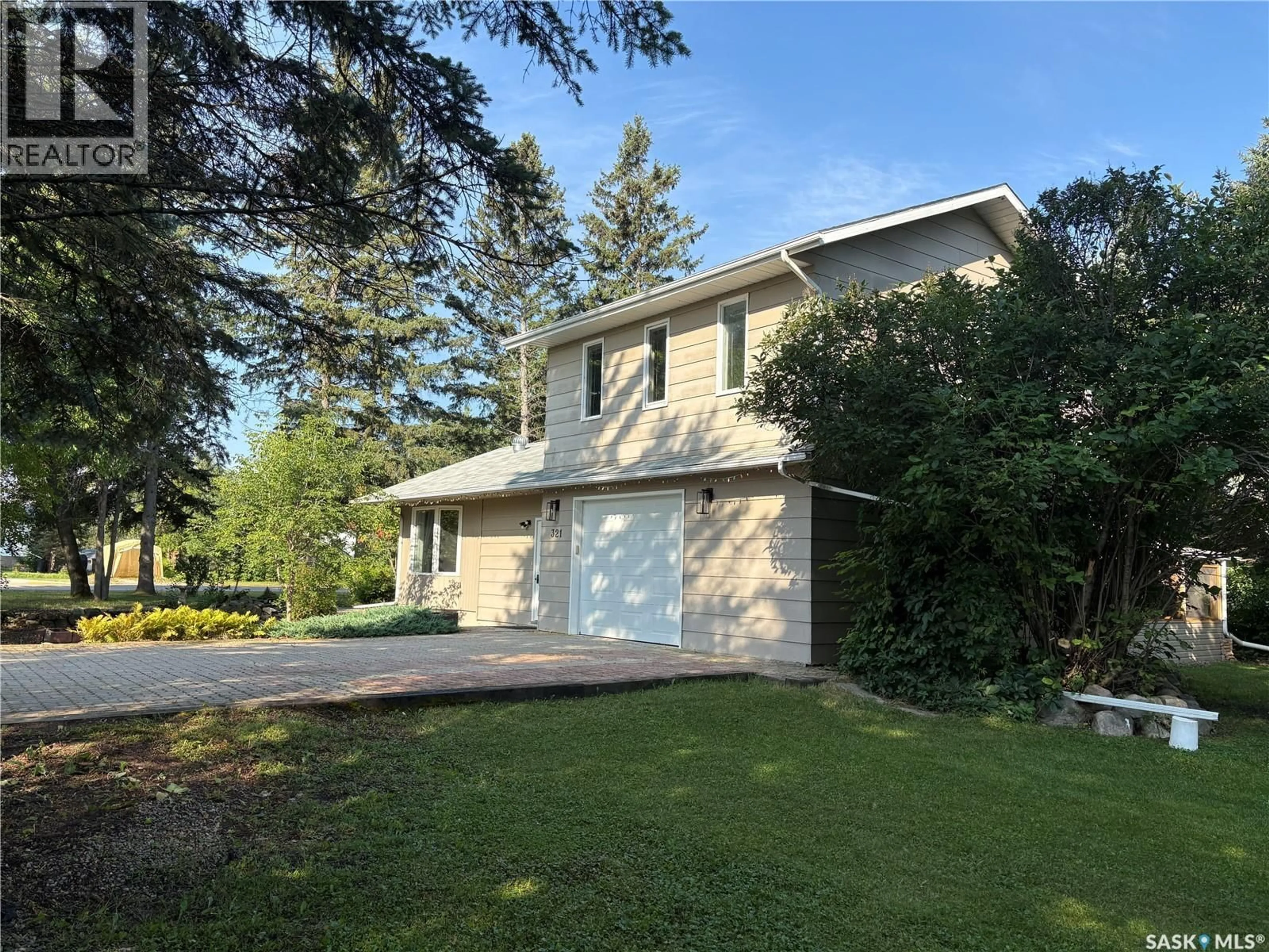 A pic from outside/outdoor area/front of a property/back of a property/a pic from drone, street for N - 321 1ST AVENUE, Big River Saskatchewan S0J0E0