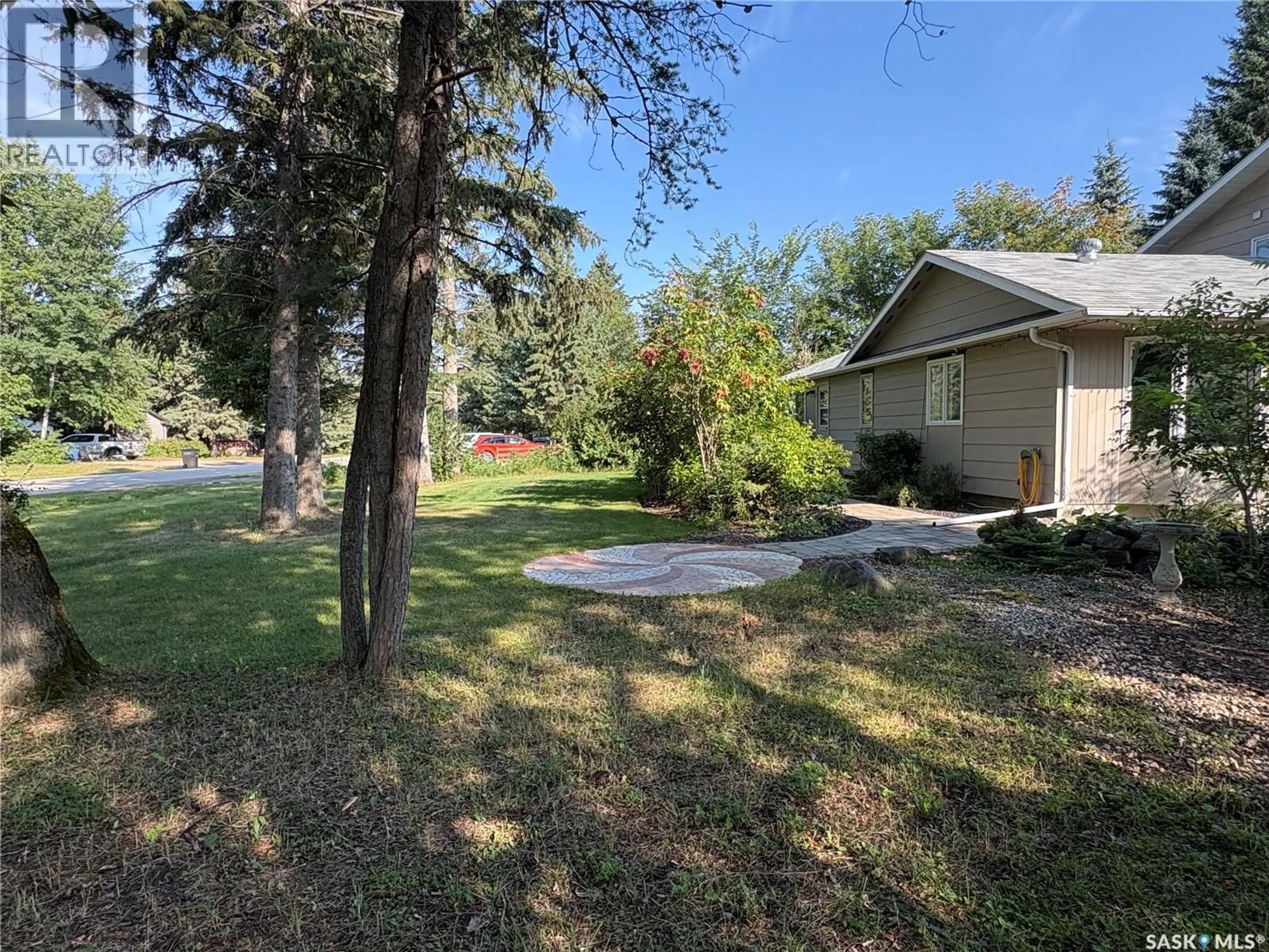 A pic from outside/outdoor area/front of a property/back of a property/a pic from drone, unknown for N - 321 1ST AVENUE, Big River Saskatchewan S0J0E0
