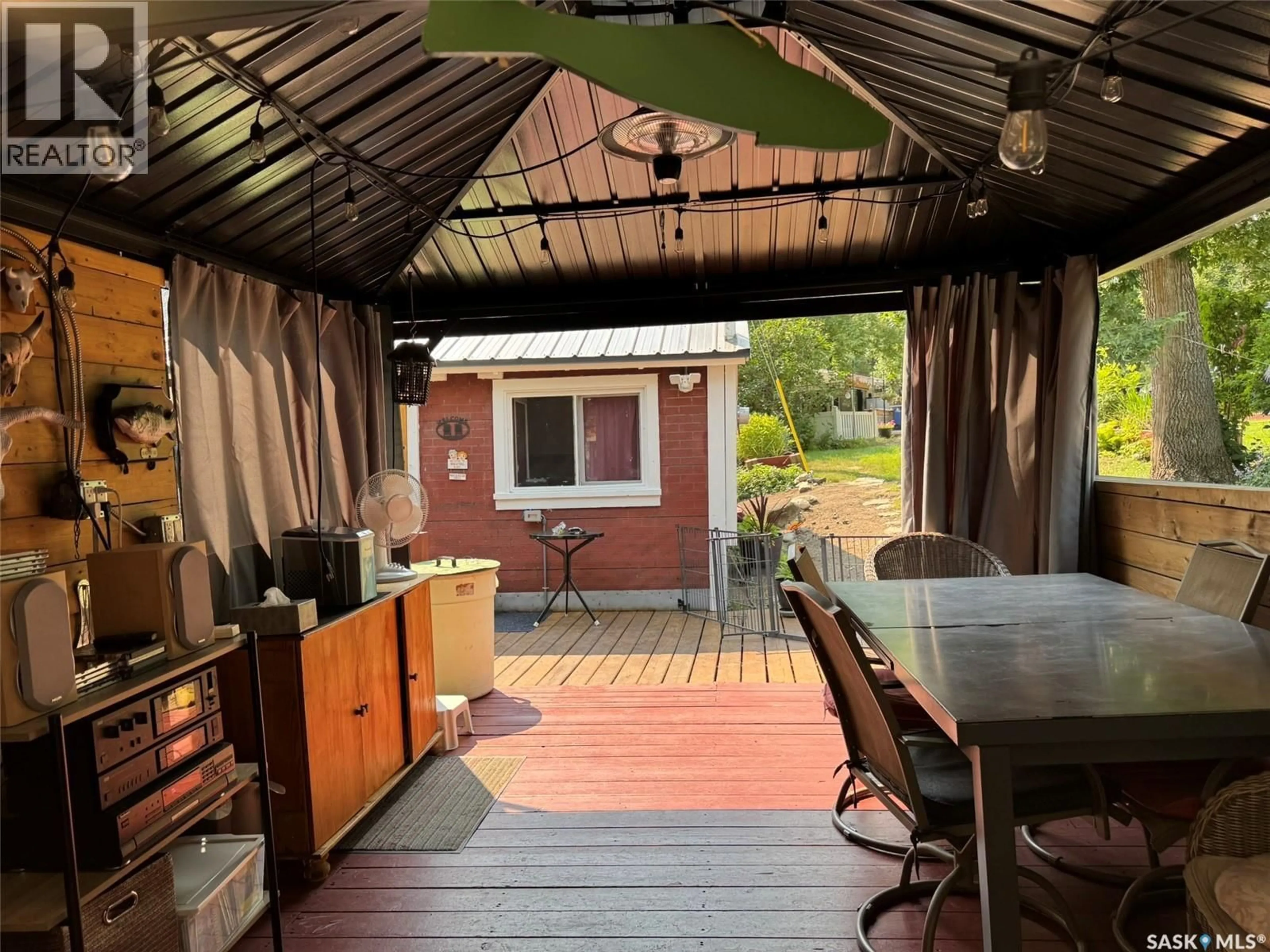 Patio, street for 2 GROVE LANE, Grandview Beach Saskatchewan S0G4C0