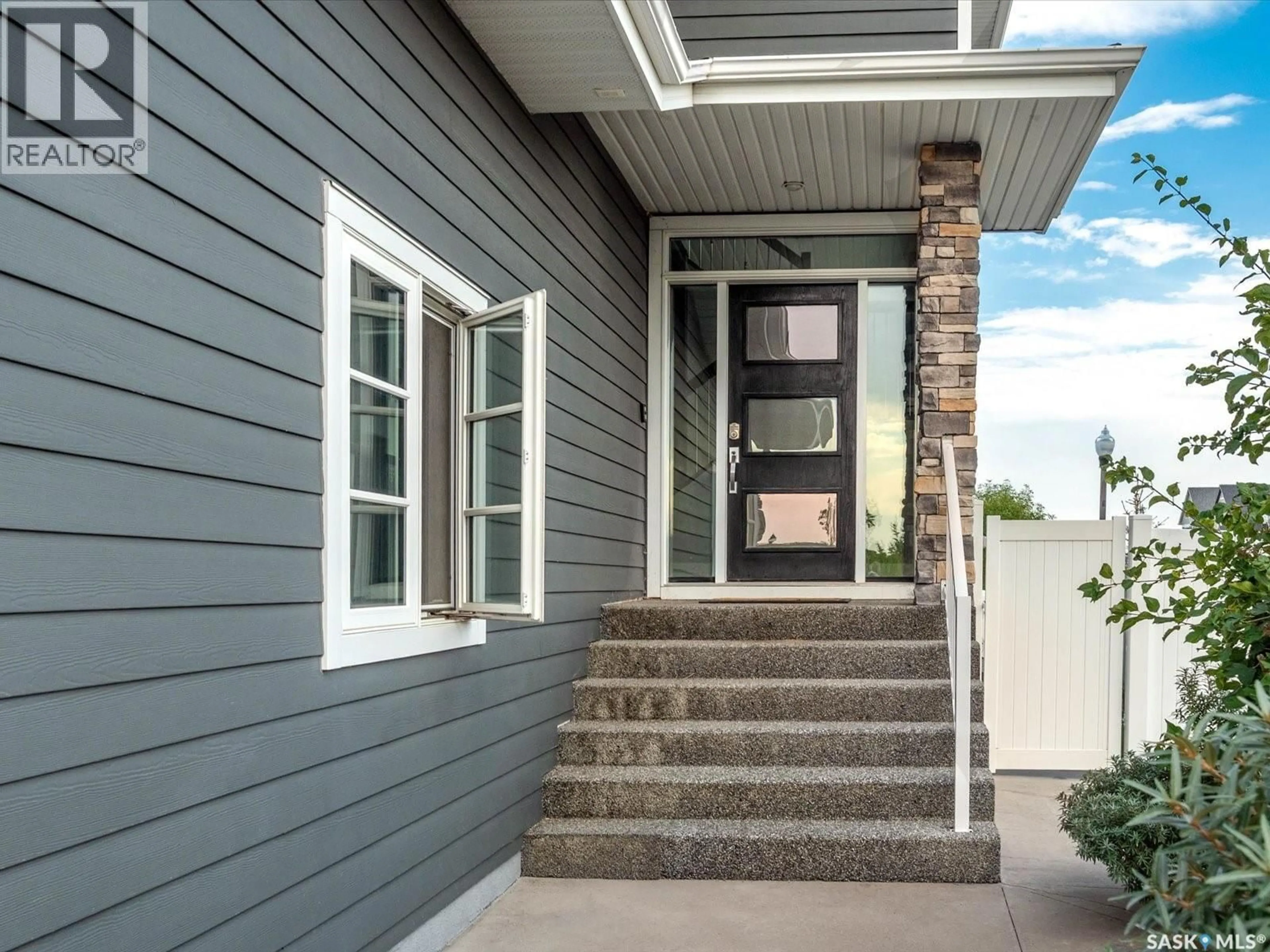 Home with vinyl exterior material, street for 3633 GREEN WATER DRIVE, Regina Saskatchewan S4V1R3
