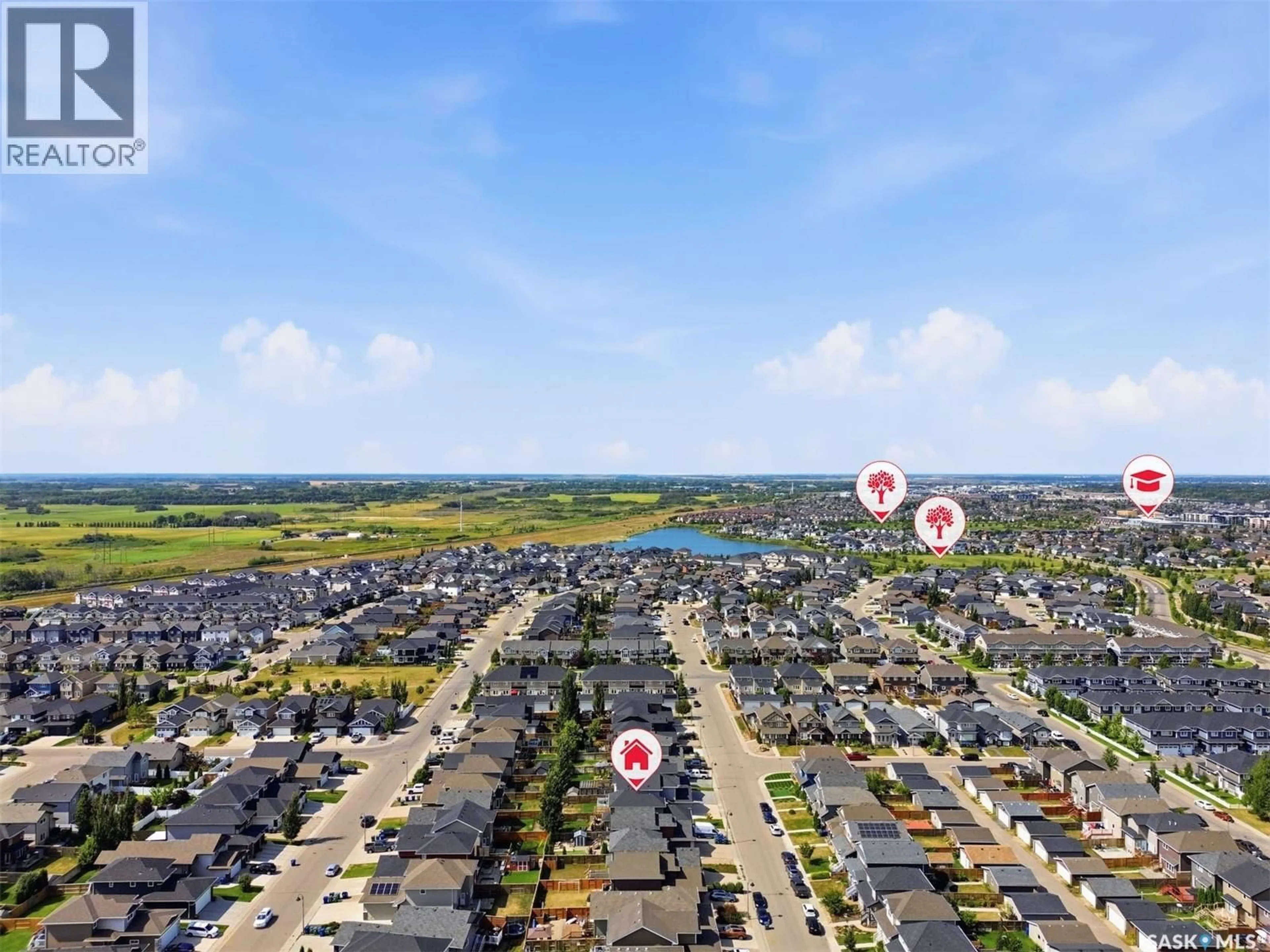 A pic from outside/outdoor area/front of a property/back of a property/a pic from drone, water/lake/river/ocean view for 451 VELTKAMP CRESCENT, Saskatoon Saskatchewan S7T0S1