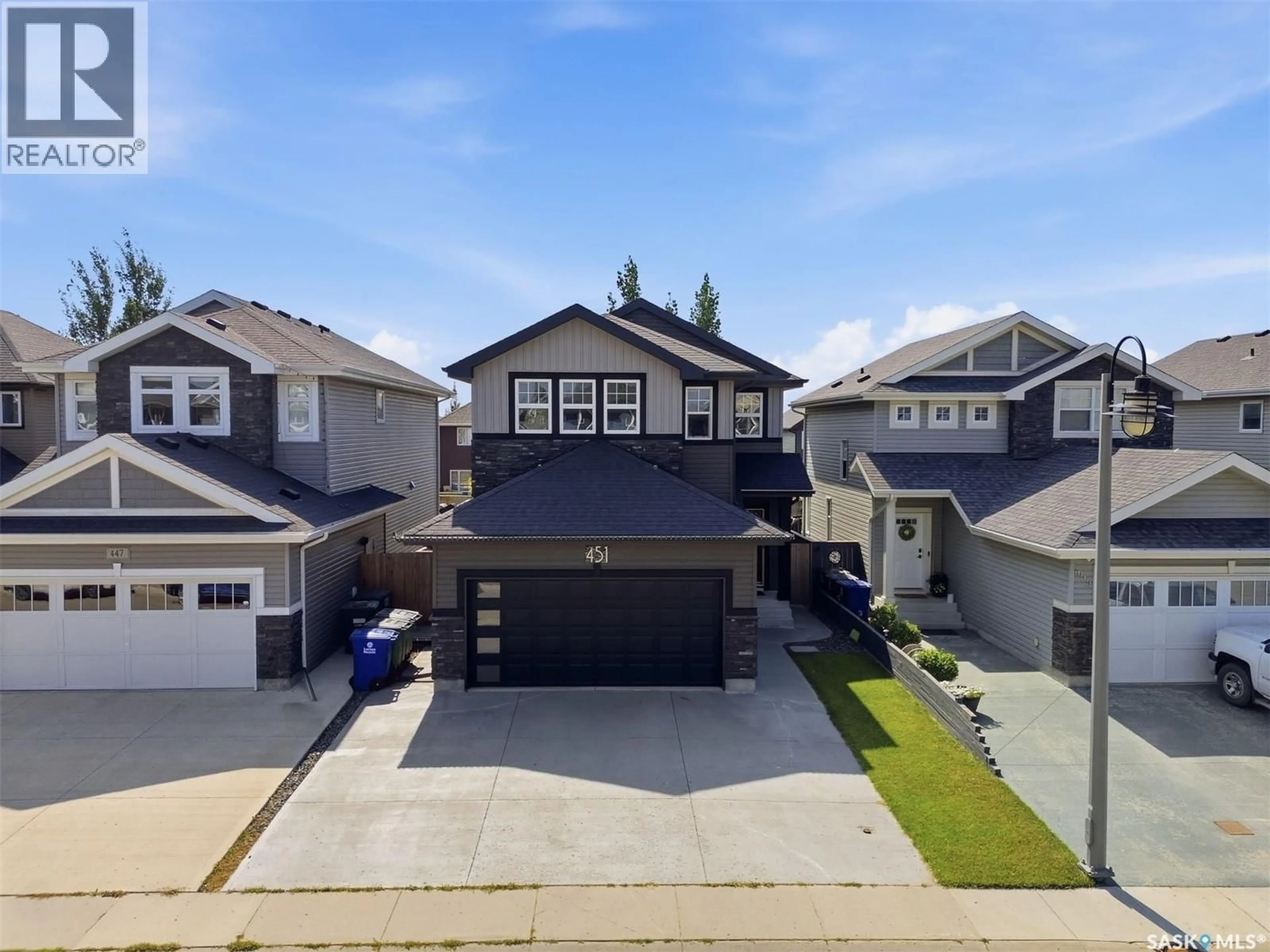 A pic from outside/outdoor area/front of a property/back of a property/a pic from drone, street for 451 VELTKAMP CRESCENT, Saskatoon Saskatchewan S7T0S1