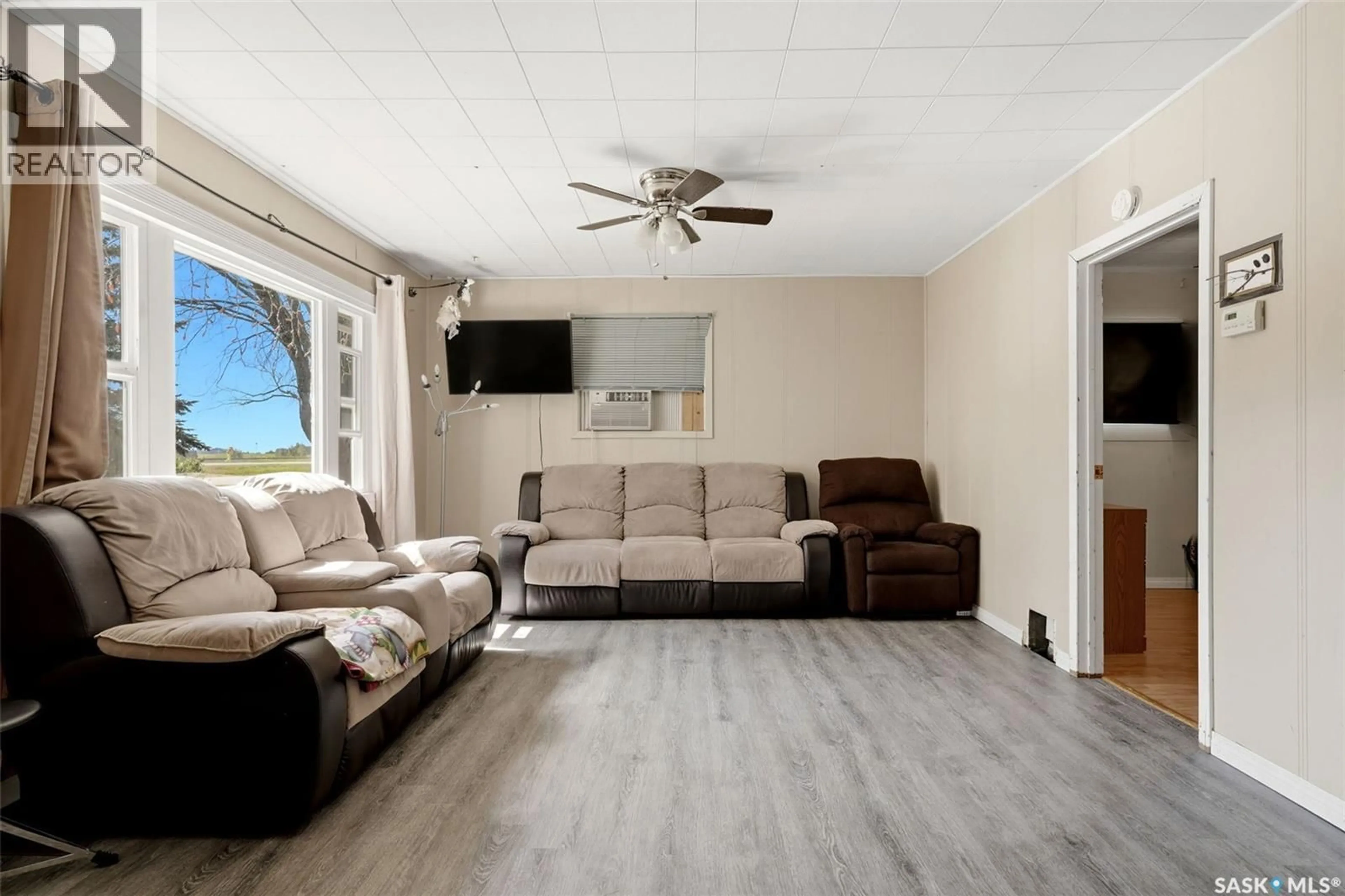 Living room with furniture, unknown for 205 FIRST AVENUE, Kelliher Saskatchewan S0A1V0