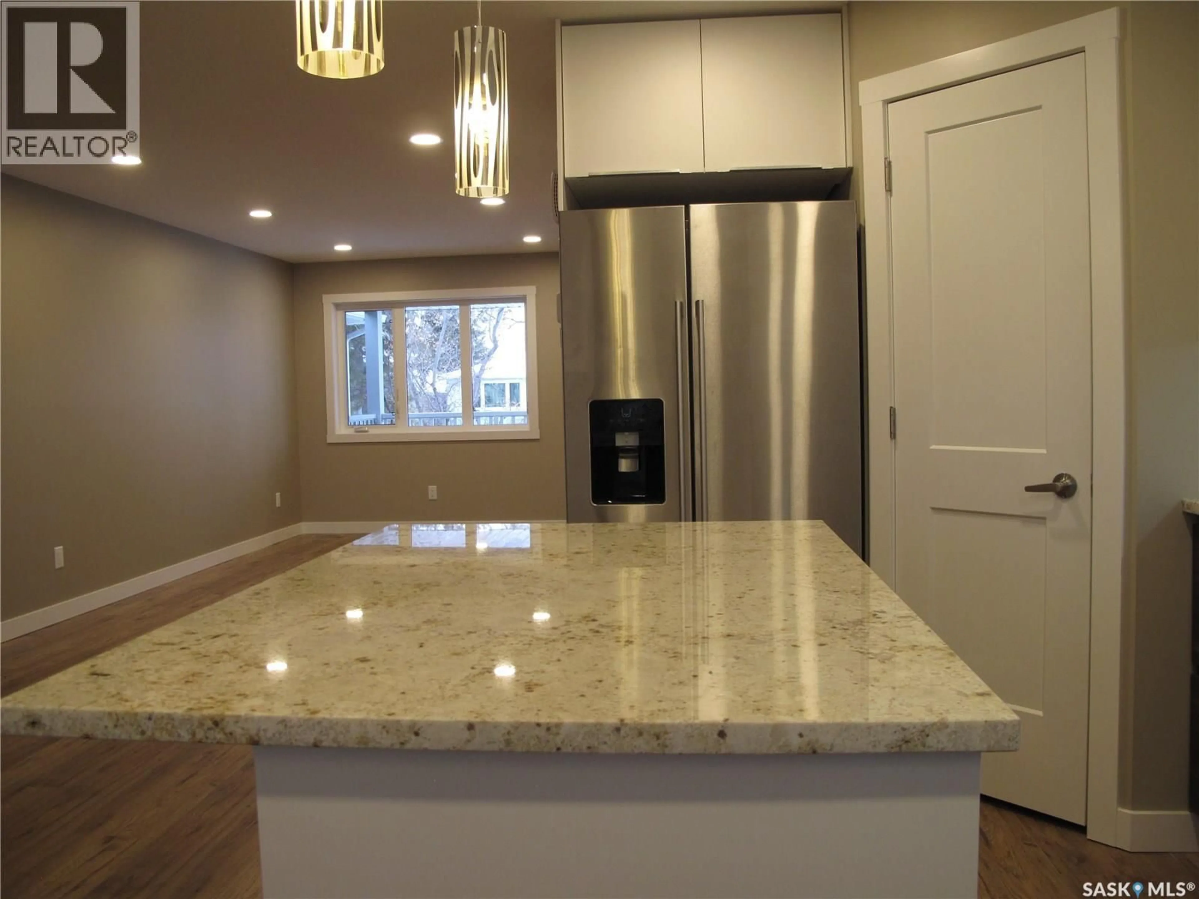 Open concept kitchen, ceramic/tile floor for 2261 MCARA STREET, Regina Saskatchewan S4N2W2