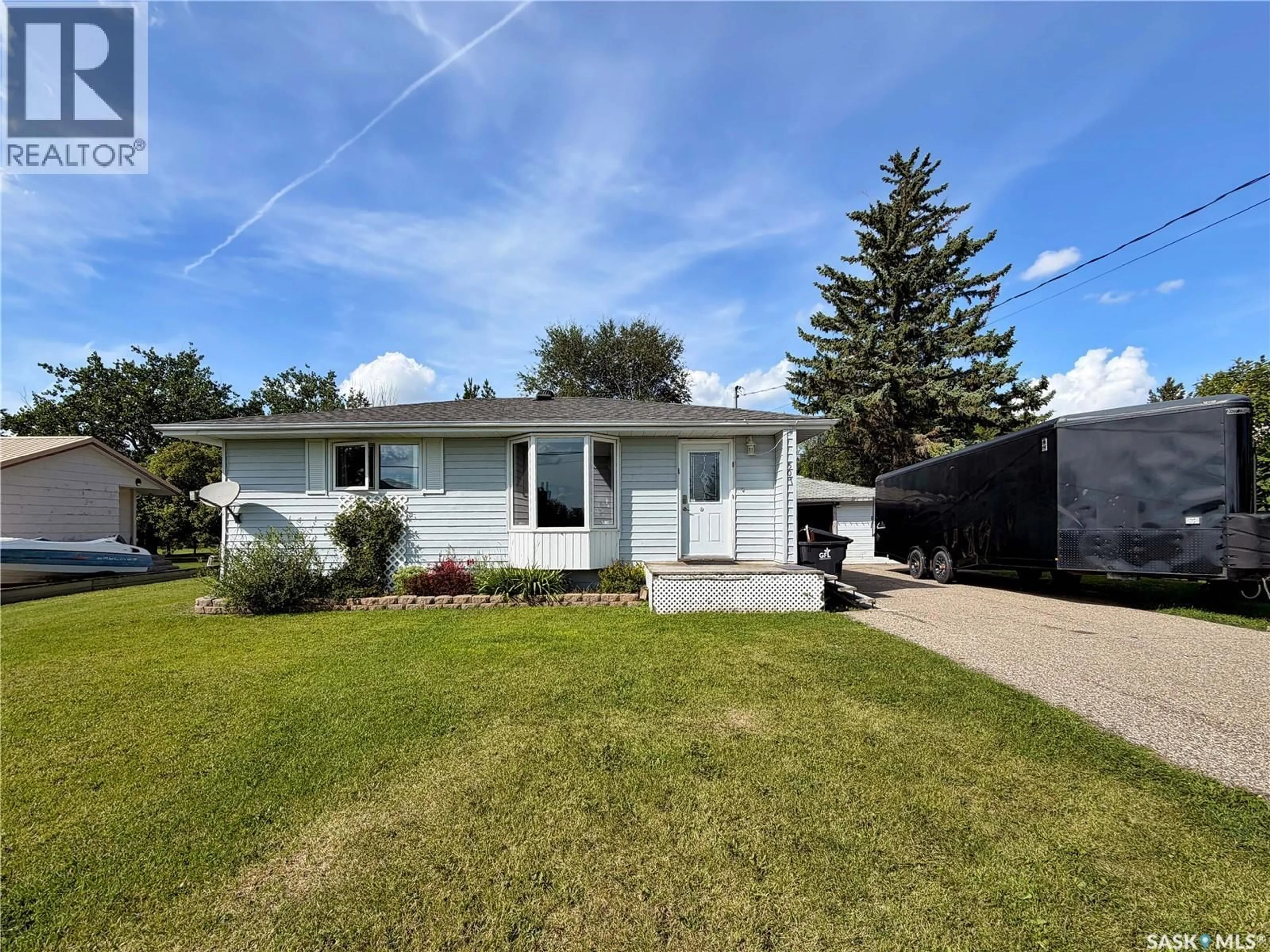 Home with vinyl exterior material, street for 507 PRAIRIE AVENUE, Arcola Saskatchewan S0C0G0