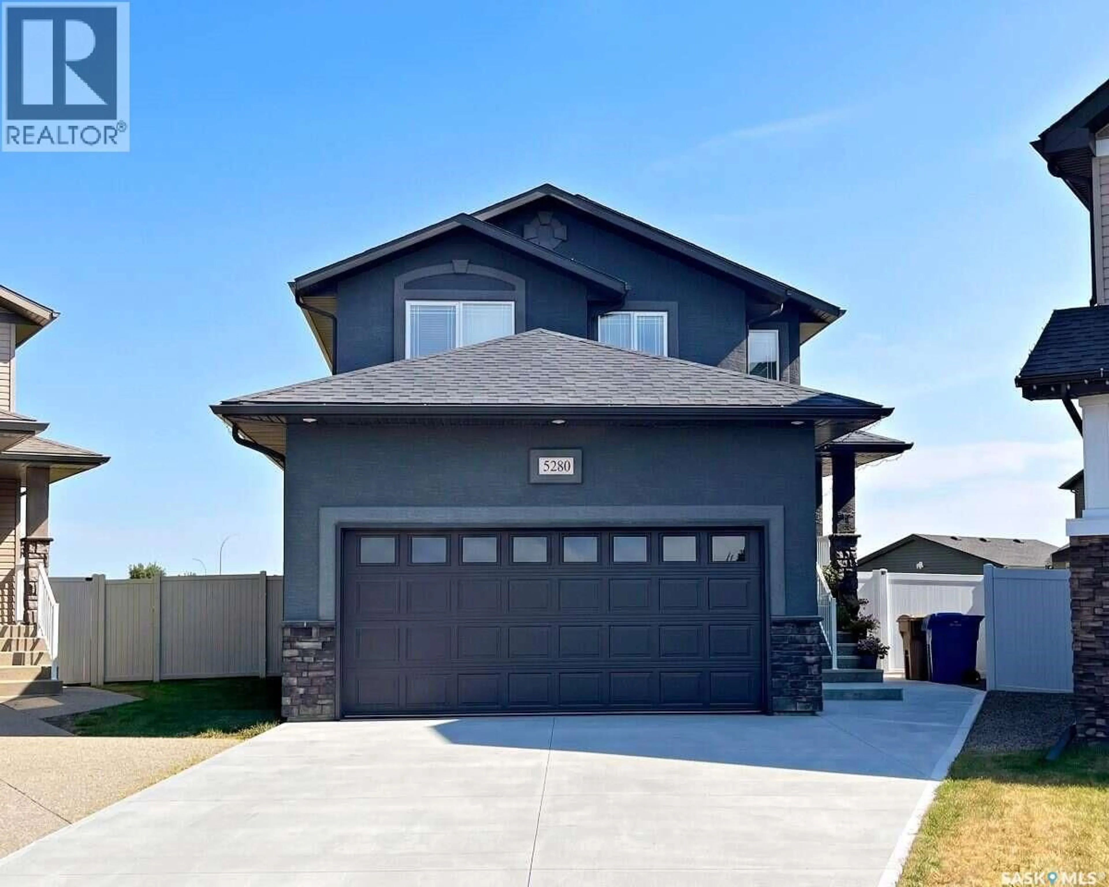 Home with vinyl exterior material, street for 5280 AERIAL CRESCENT, Regina Saskatchewan S4W0C8