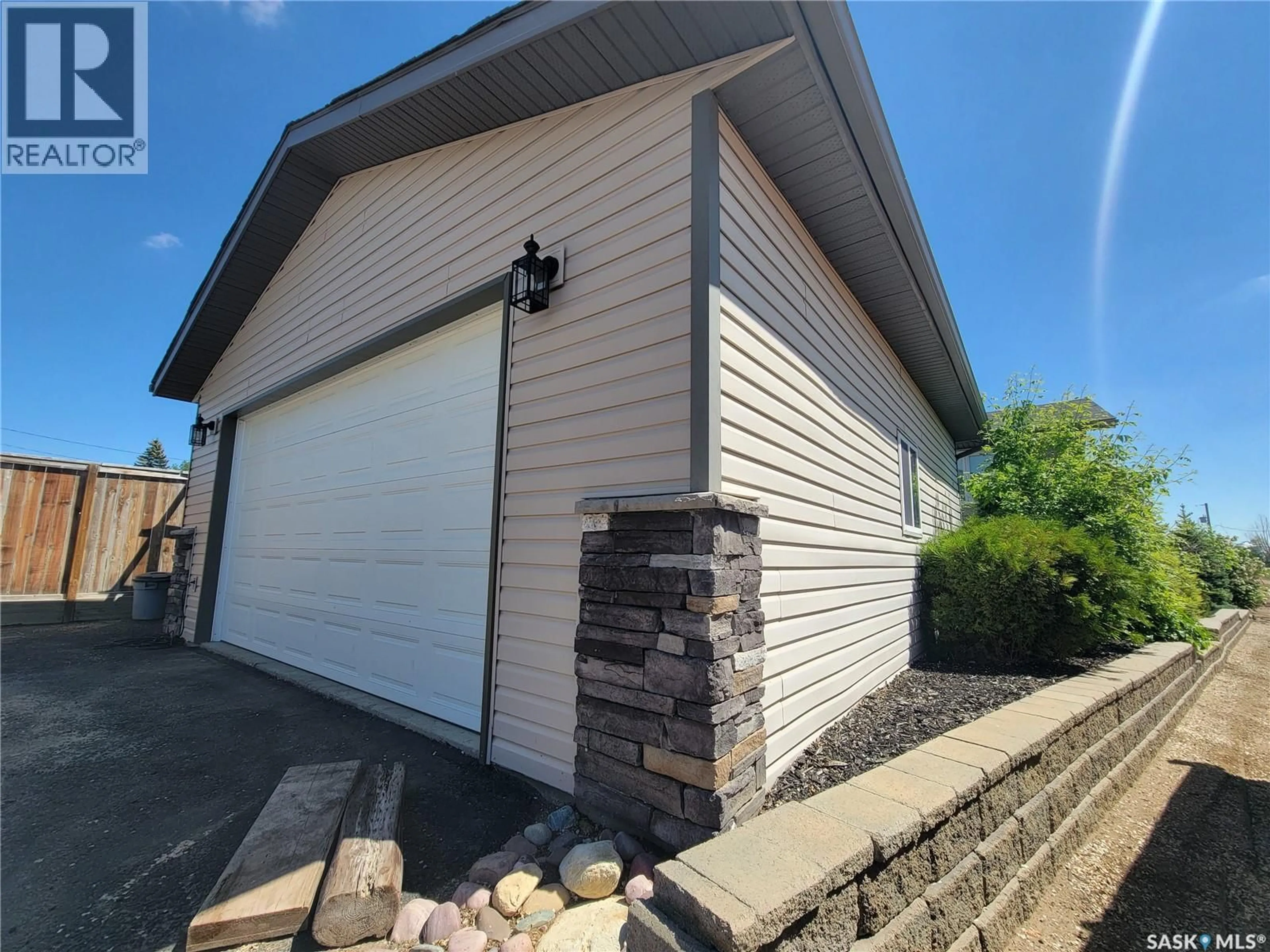 Home with vinyl exterior material, street for 4702 LEADER STREET, Macklin Saskatchewan S0L2C0