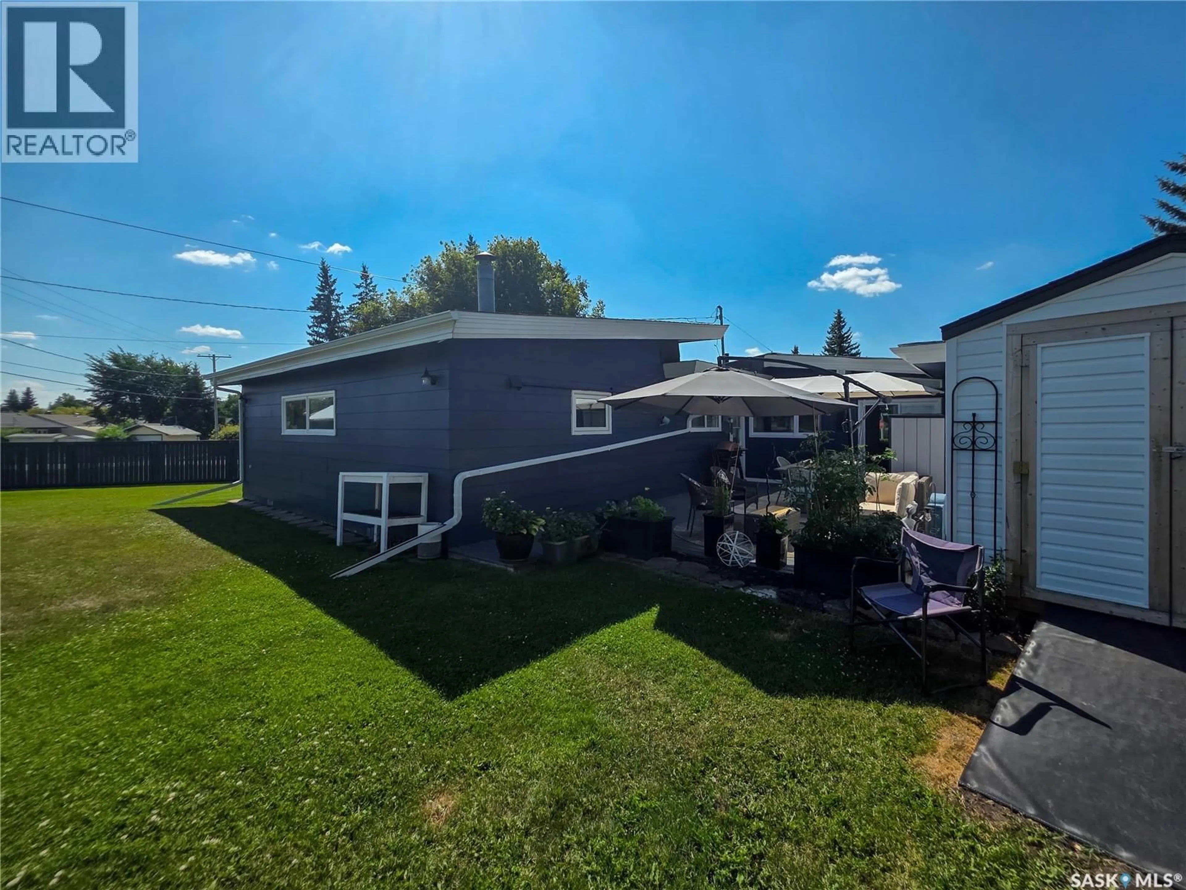 A pic from outside/outdoor area/front of a property/back of a property/a pic from drone, unknown for 808 PRINCE EDWARD STREET, Melville Saskatchewan S0A2P0