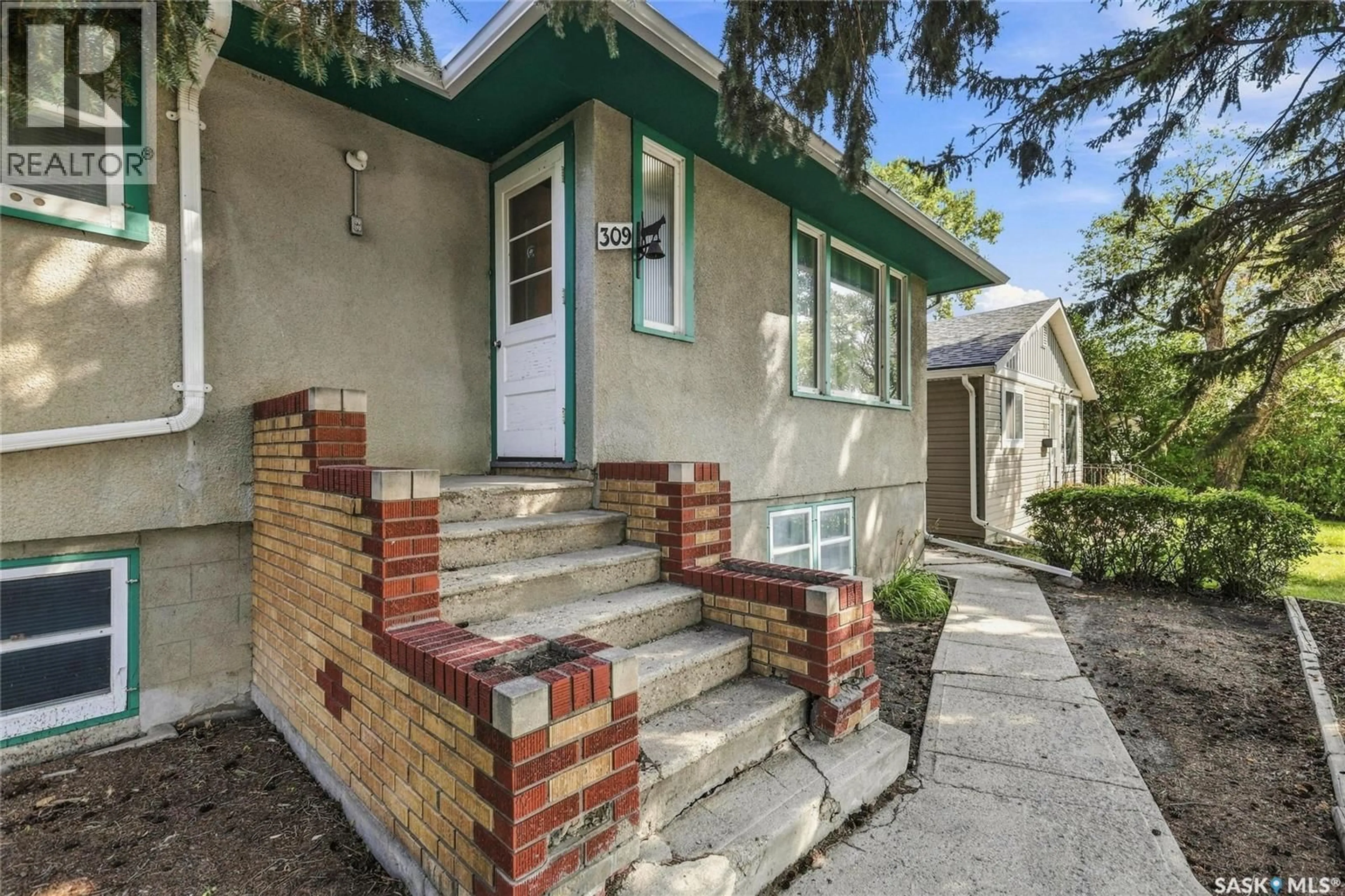 Home with brick exterior material, street for 309 ST JOHN STREET, Regina Saskatchewan S4R1R1