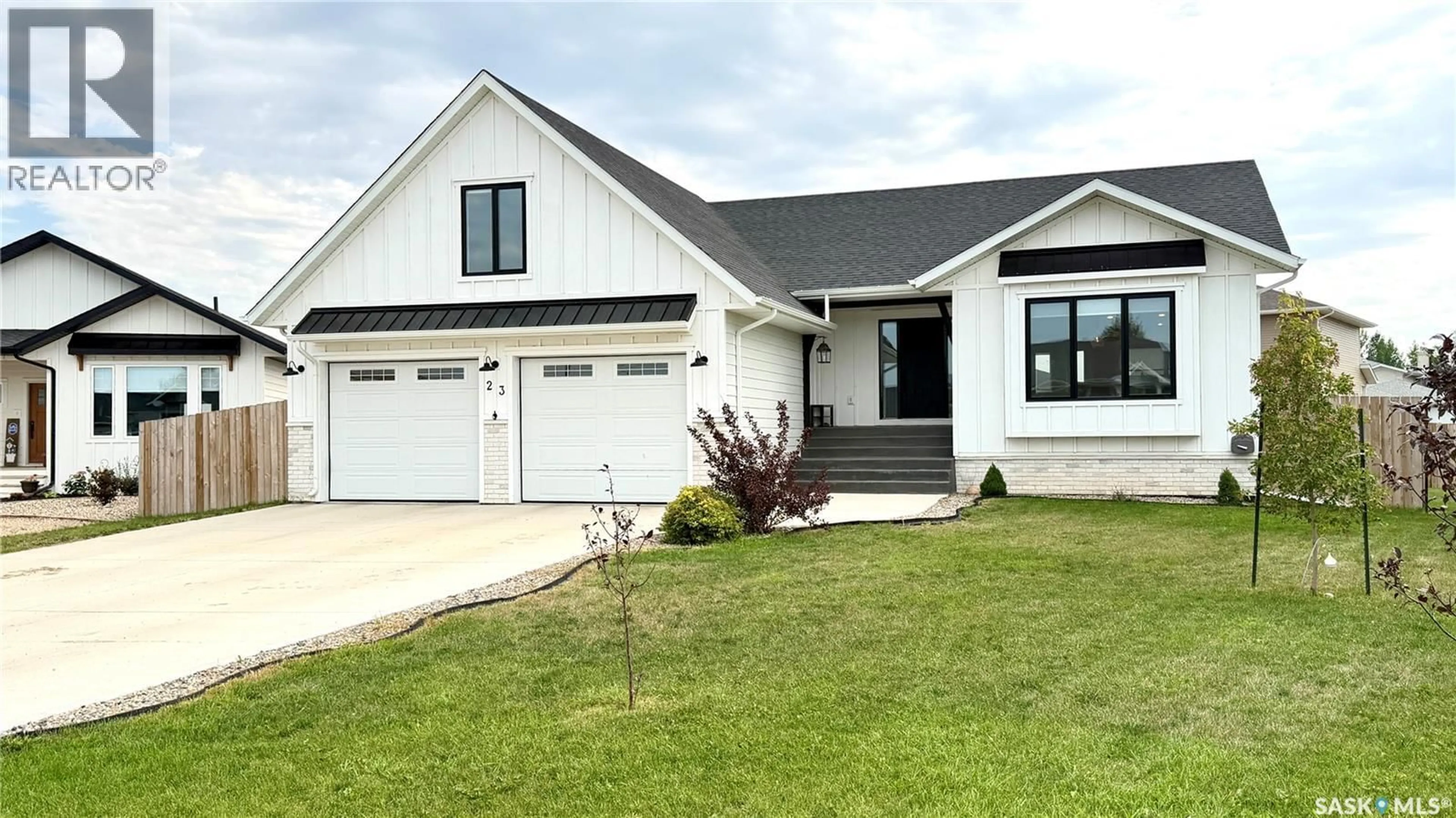 Home with vinyl exterior material, street for 23 CHOW CRESCENT, Outlook Saskatchewan S0L2N0