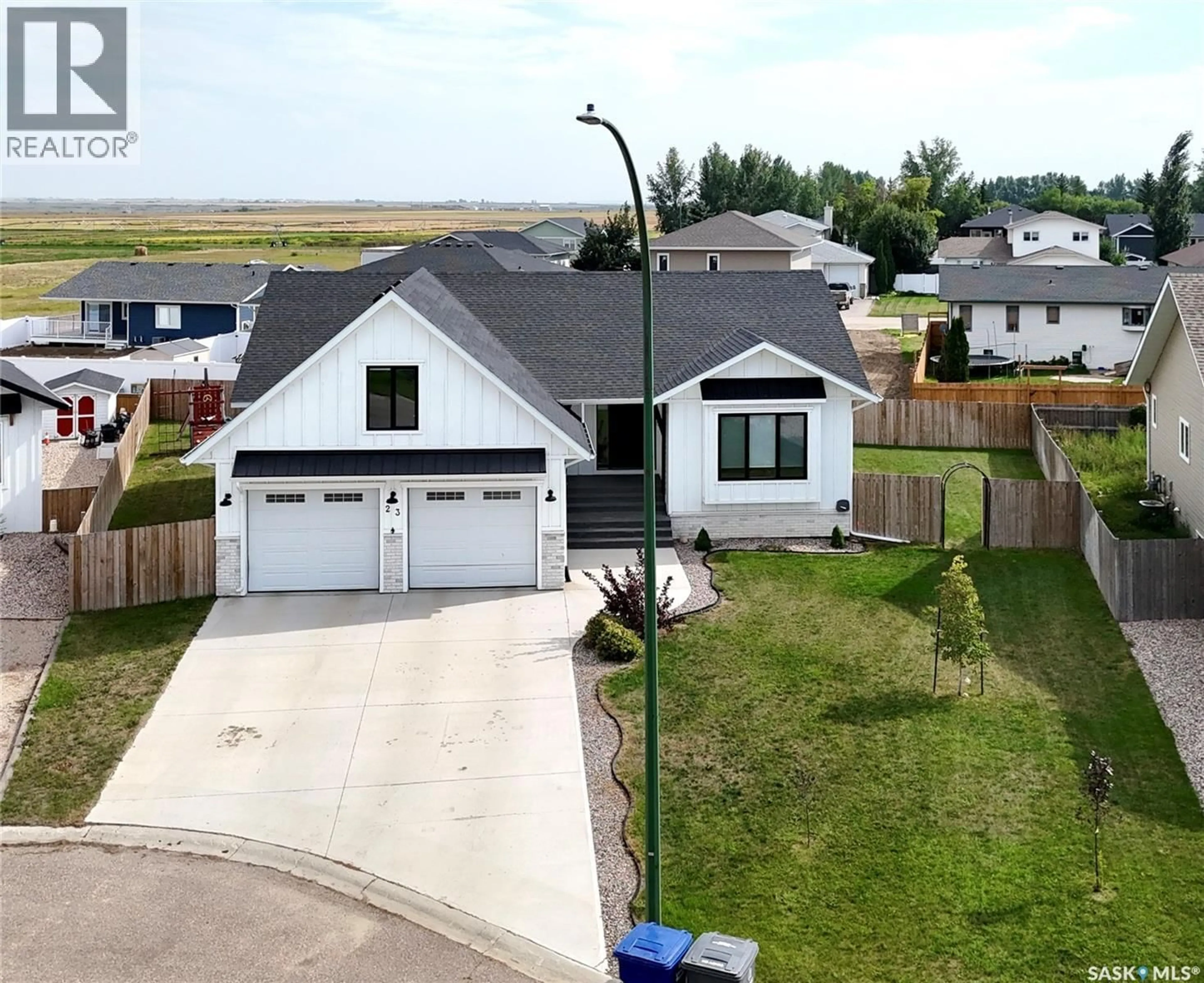 A pic from outside/outdoor area/front of a property/back of a property/a pic from drone, unknown for 23 CHOW CRESCENT, Outlook Saskatchewan S0L2N0
