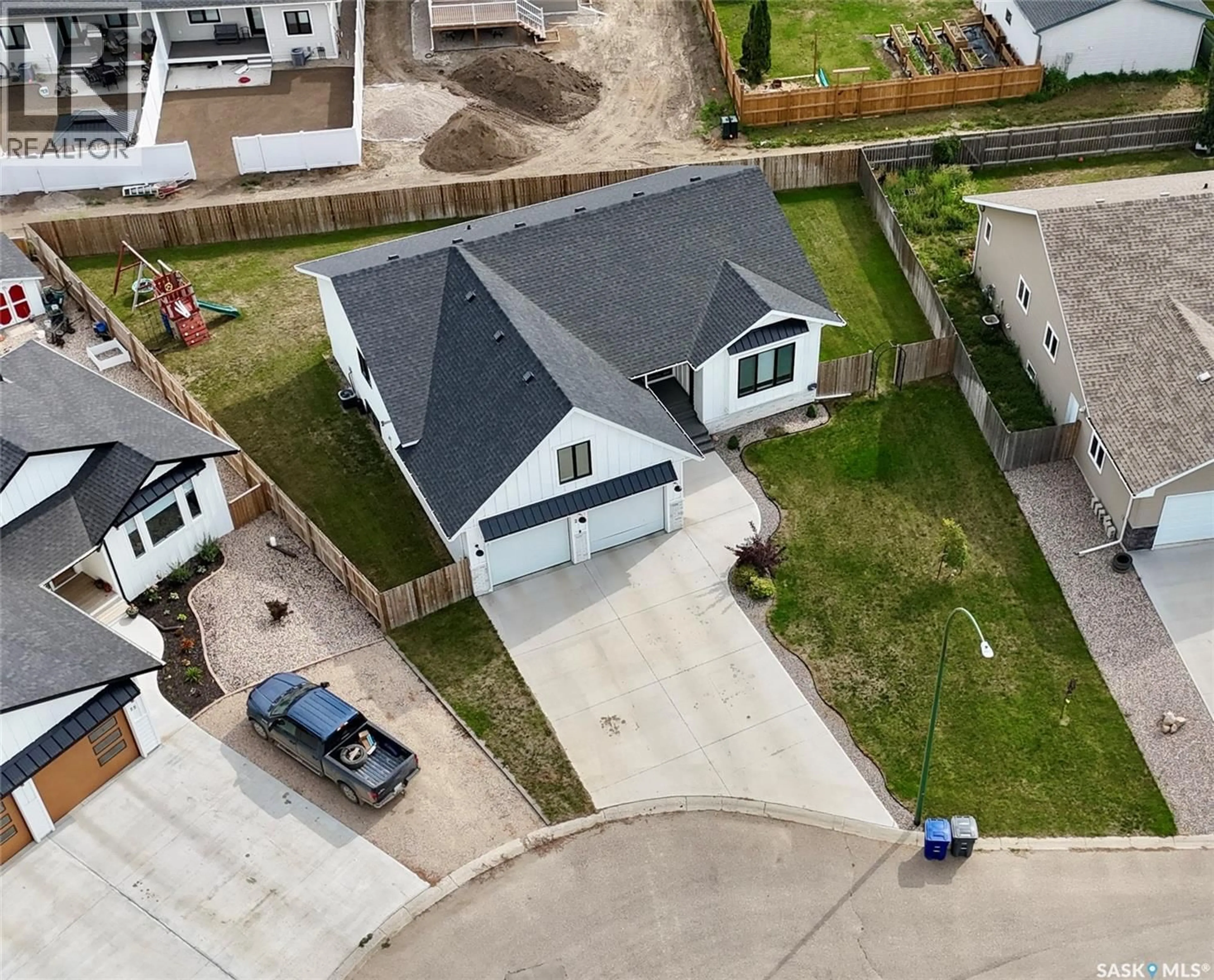 A pic from outside/outdoor area/front of a property/back of a property/a pic from drone, street for 23 CHOW CRESCENT, Outlook Saskatchewan S0L2N0
