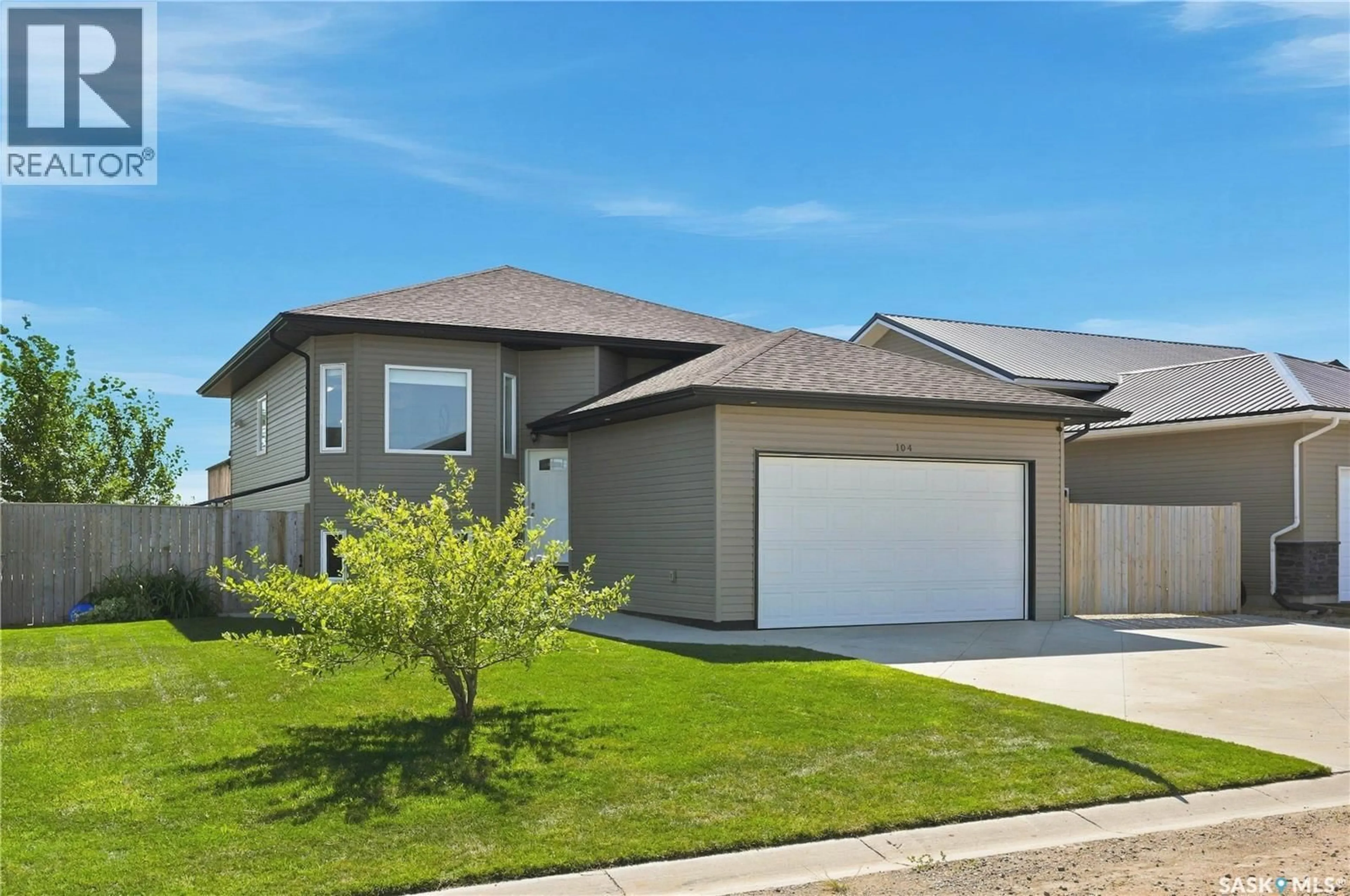 Home with vinyl exterior material, street for 104 MACDONALD STREET, Aberdeen Saskatchewan S0K0A2
