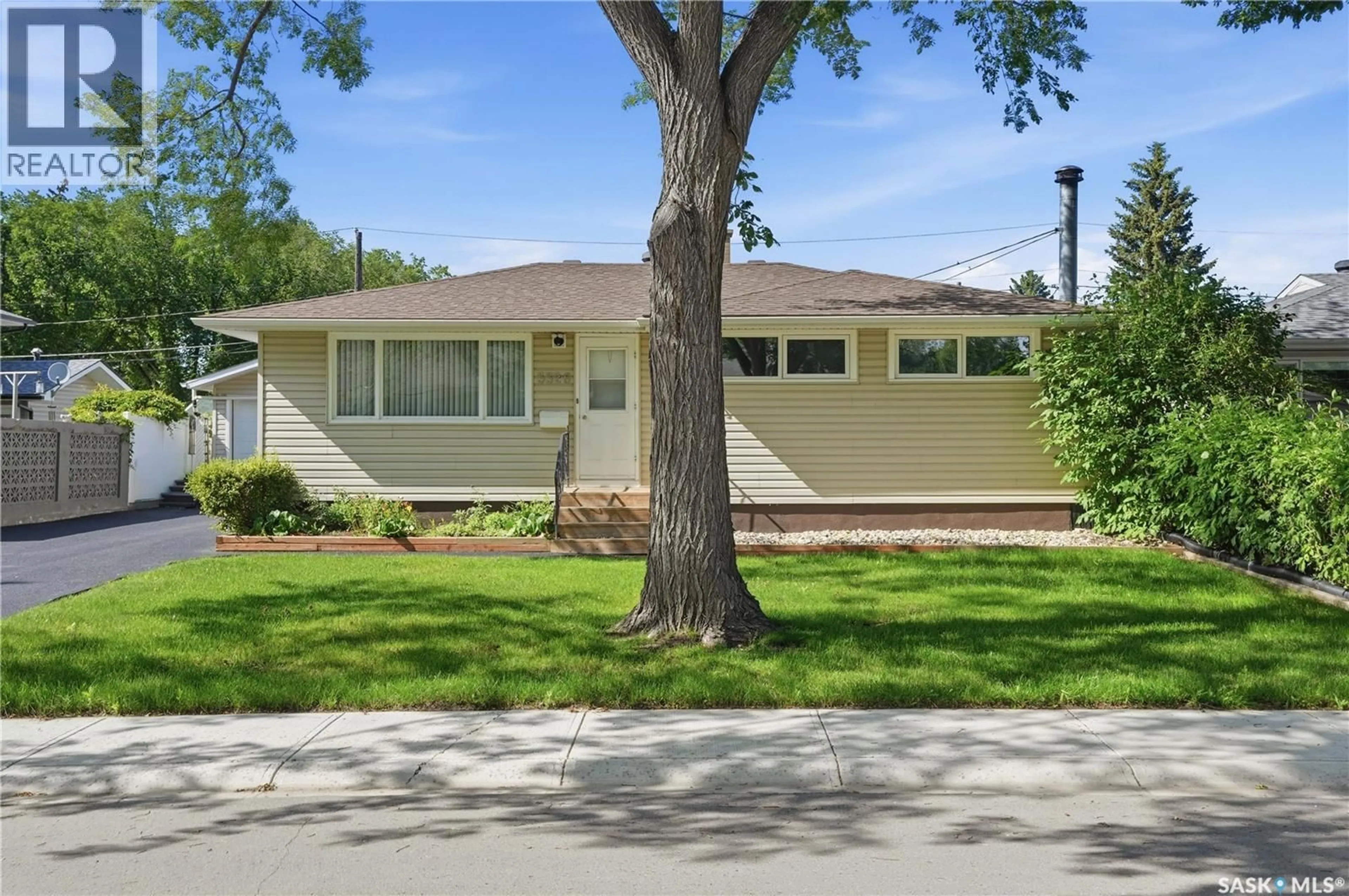 Home with vinyl exterior material, street for 3326 4TH AVENUE, Regina Saskatchewan S4R0V6
