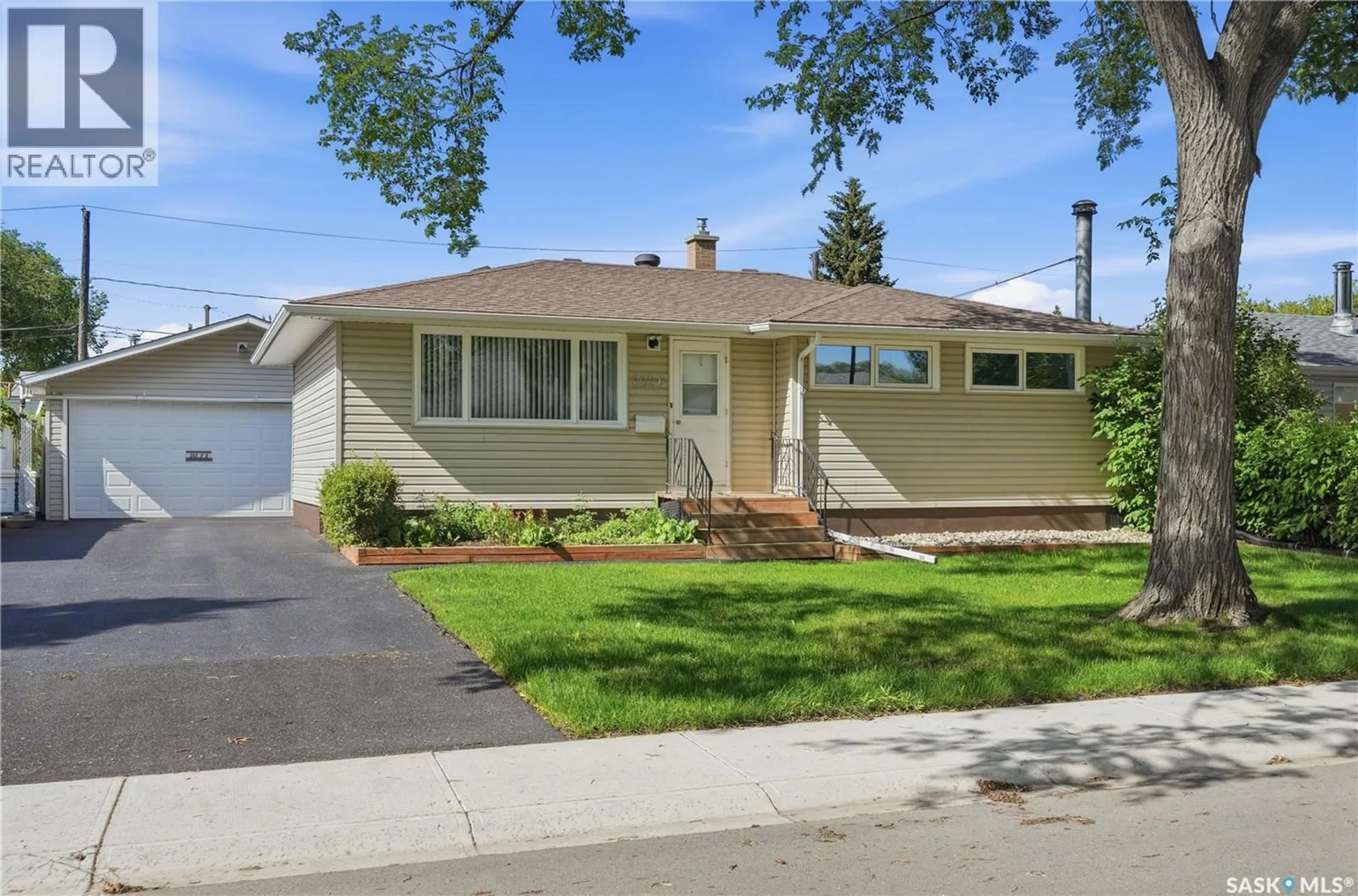 Home with vinyl exterior material, street for 3326 4TH AVENUE, Regina Saskatchewan S4R0V6