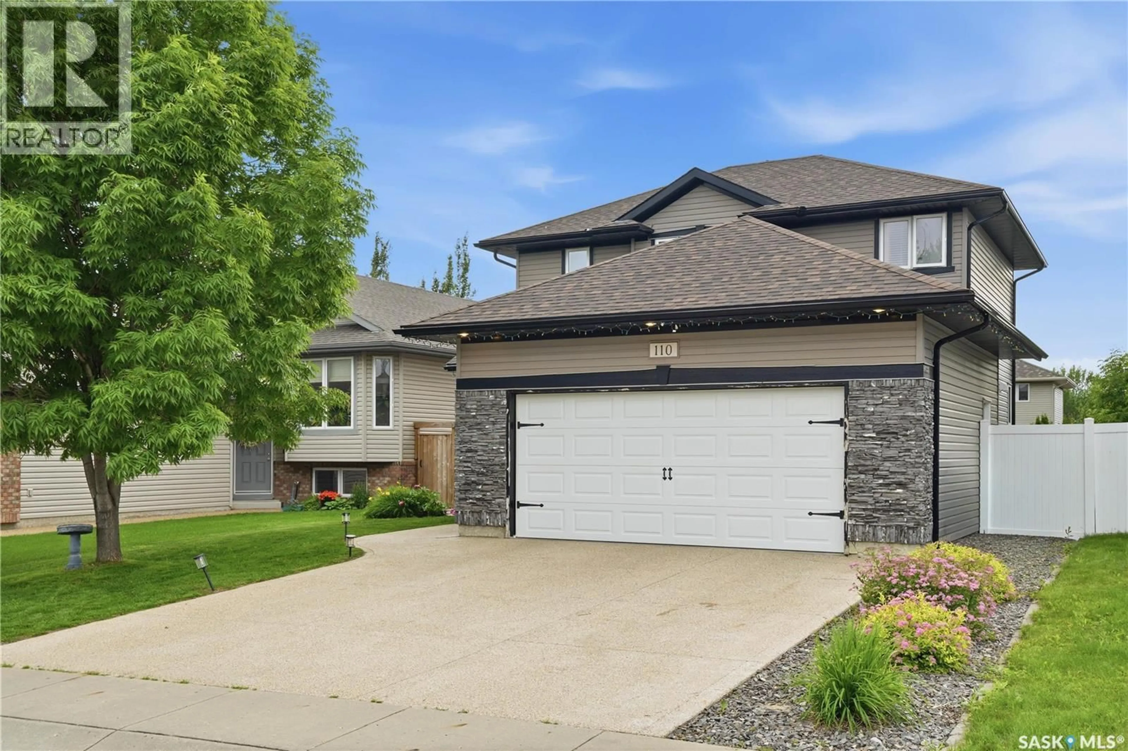 Home with vinyl exterior material, street for 110 STEPNEY CRESCENT, Saskatoon Saskatchewan S7T0A5