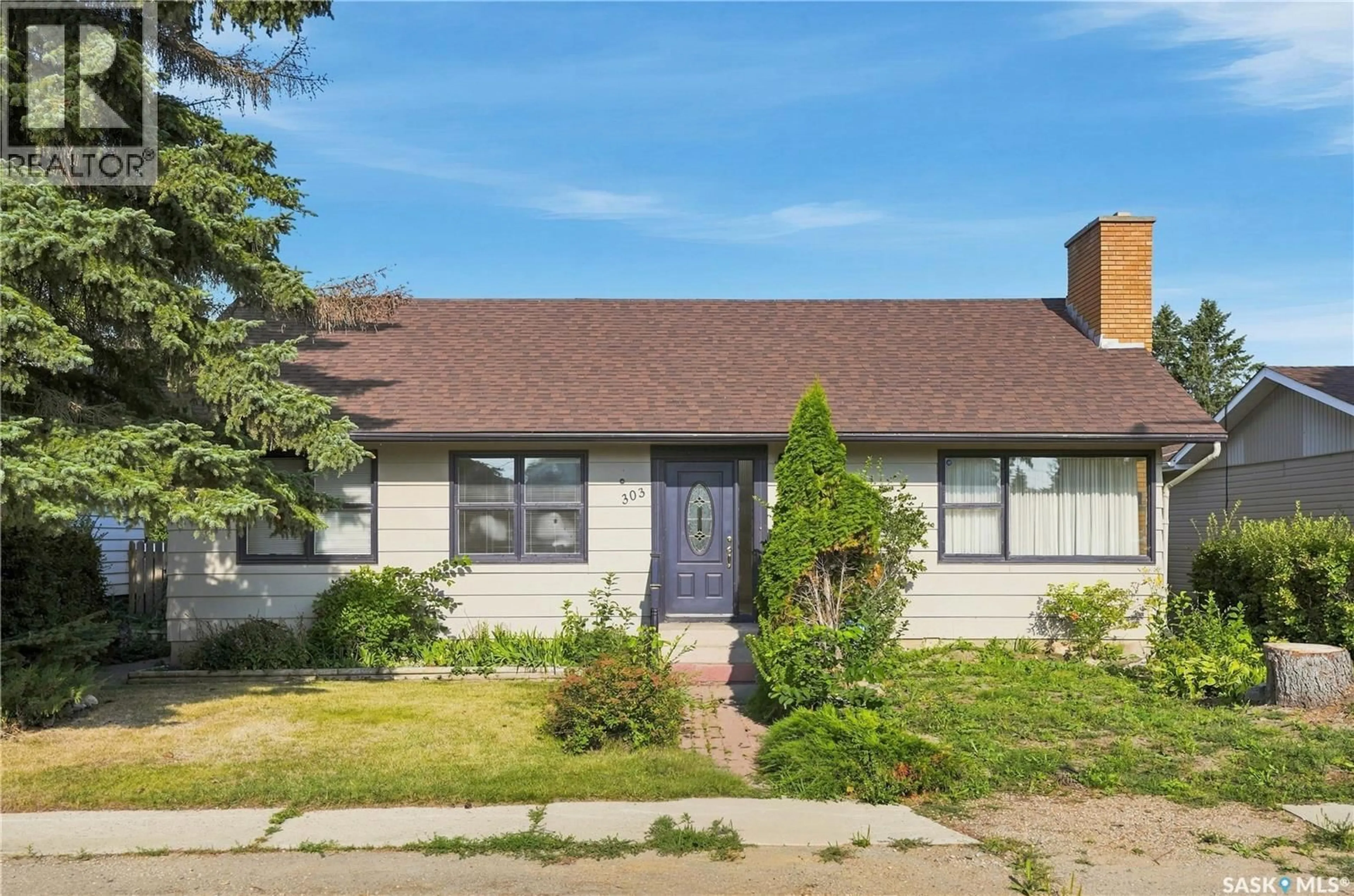 Home with vinyl exterior material, street for 303 ORONSAY STREET, Colonsay Saskatchewan S0K0Z0
