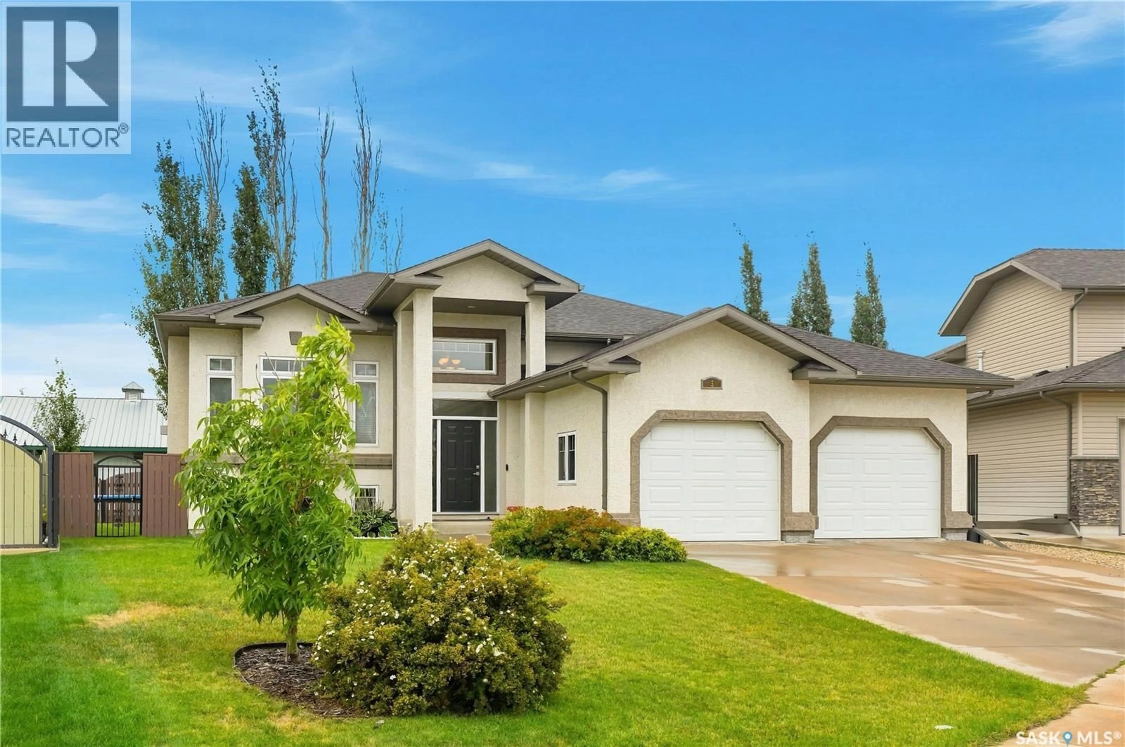 Home with vinyl exterior material, street for 5 BROOKLYN COURT, Warman Saskatchewan S0K0A1