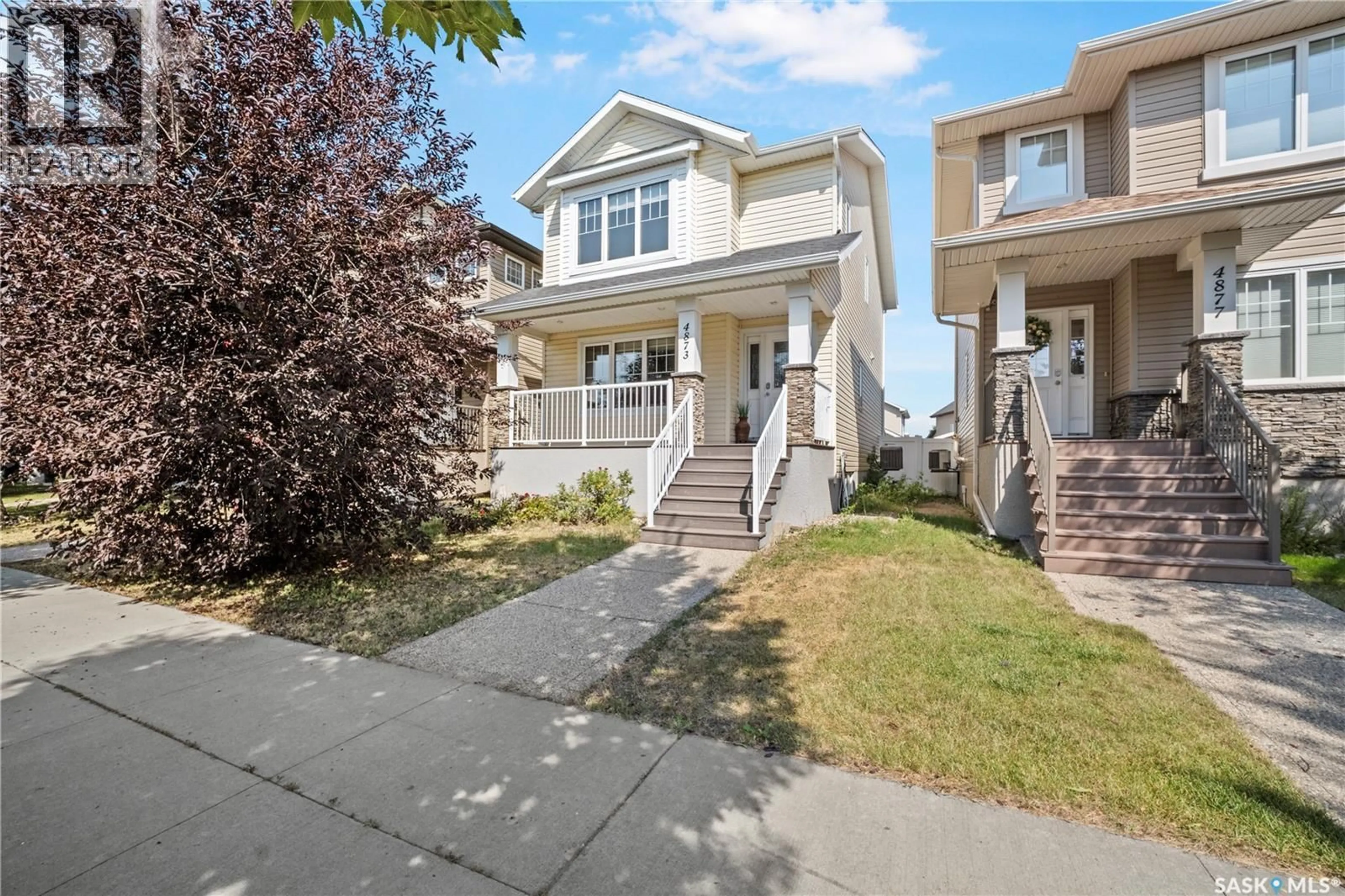 Home with vinyl exterior material, street for 4873 JAMES HILL ROAD, Regina Saskatchewan S4W0C6
