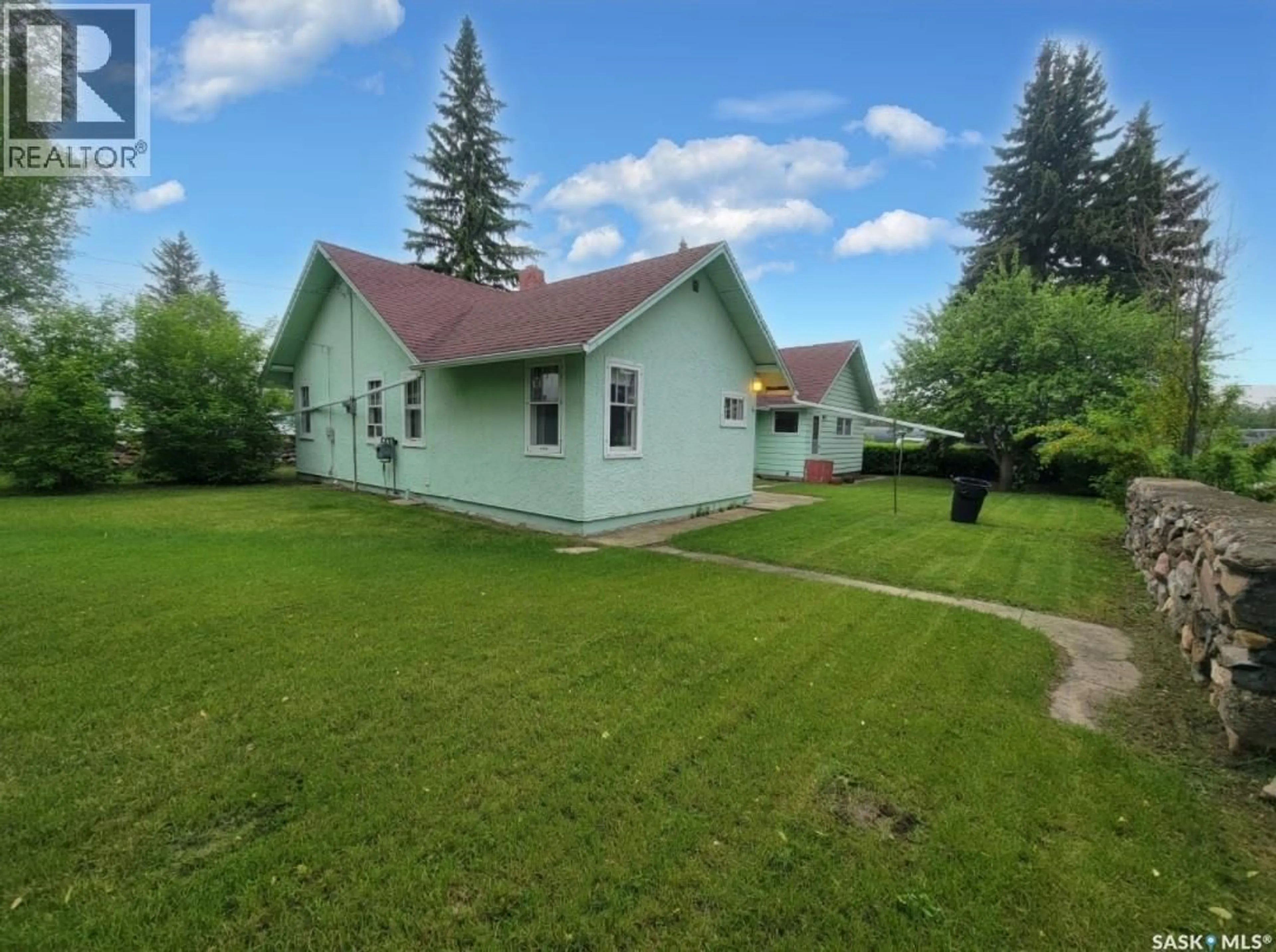 A pic from outside/outdoor area/front of a property/back of a property/a pic from drone, street for 106 RAILWAY AVENUE, Neilburg Saskatchewan S0M2C0