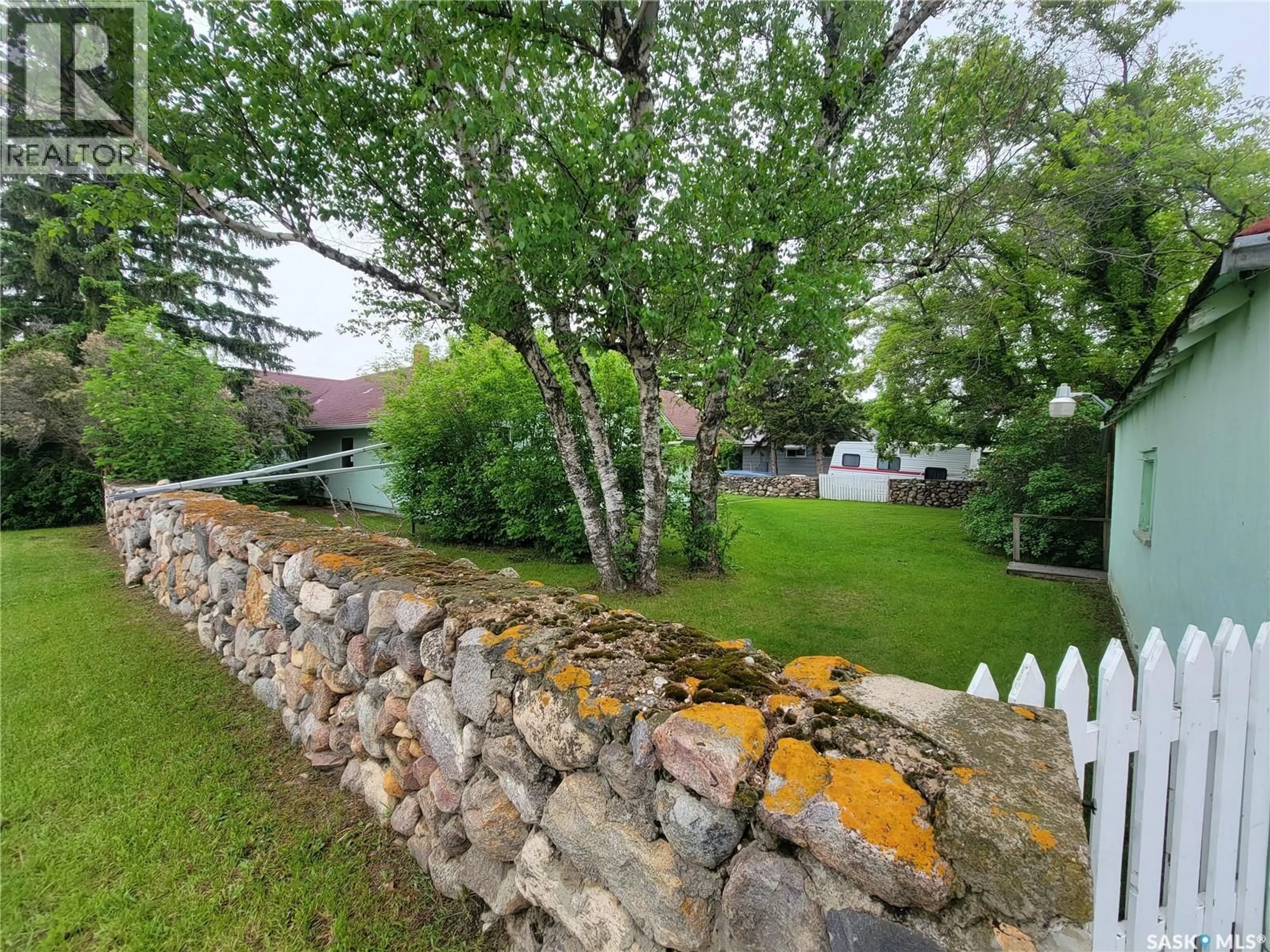 A pic from outside/outdoor area/front of a property/back of a property/a pic from drone, unknown for 106 RAILWAY AVENUE, Neilburg Saskatchewan S0M2C0