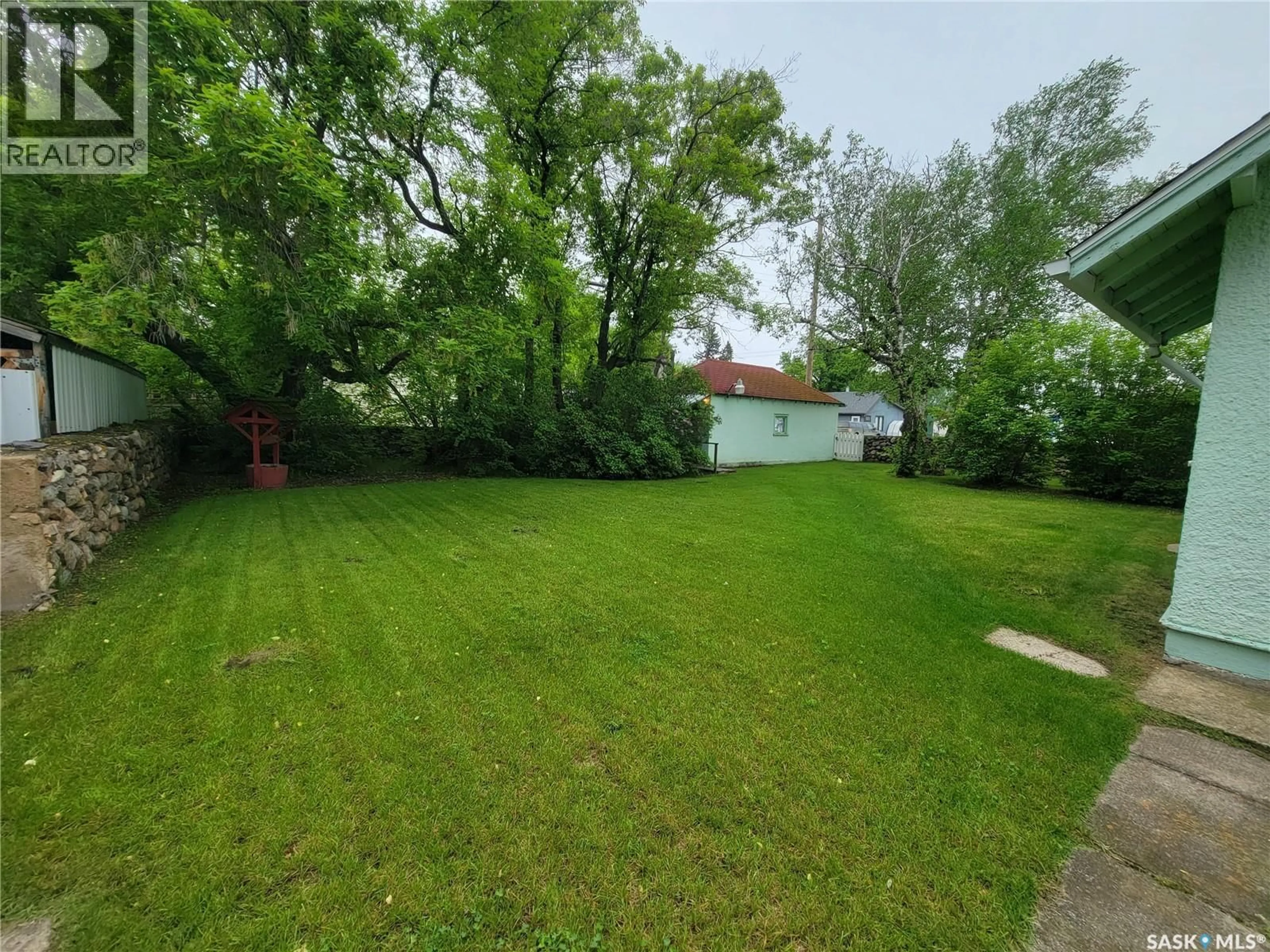 A pic from outside/outdoor area/front of a property/back of a property/a pic from drone, street for 106 RAILWAY AVENUE, Neilburg Saskatchewan S0M2C0