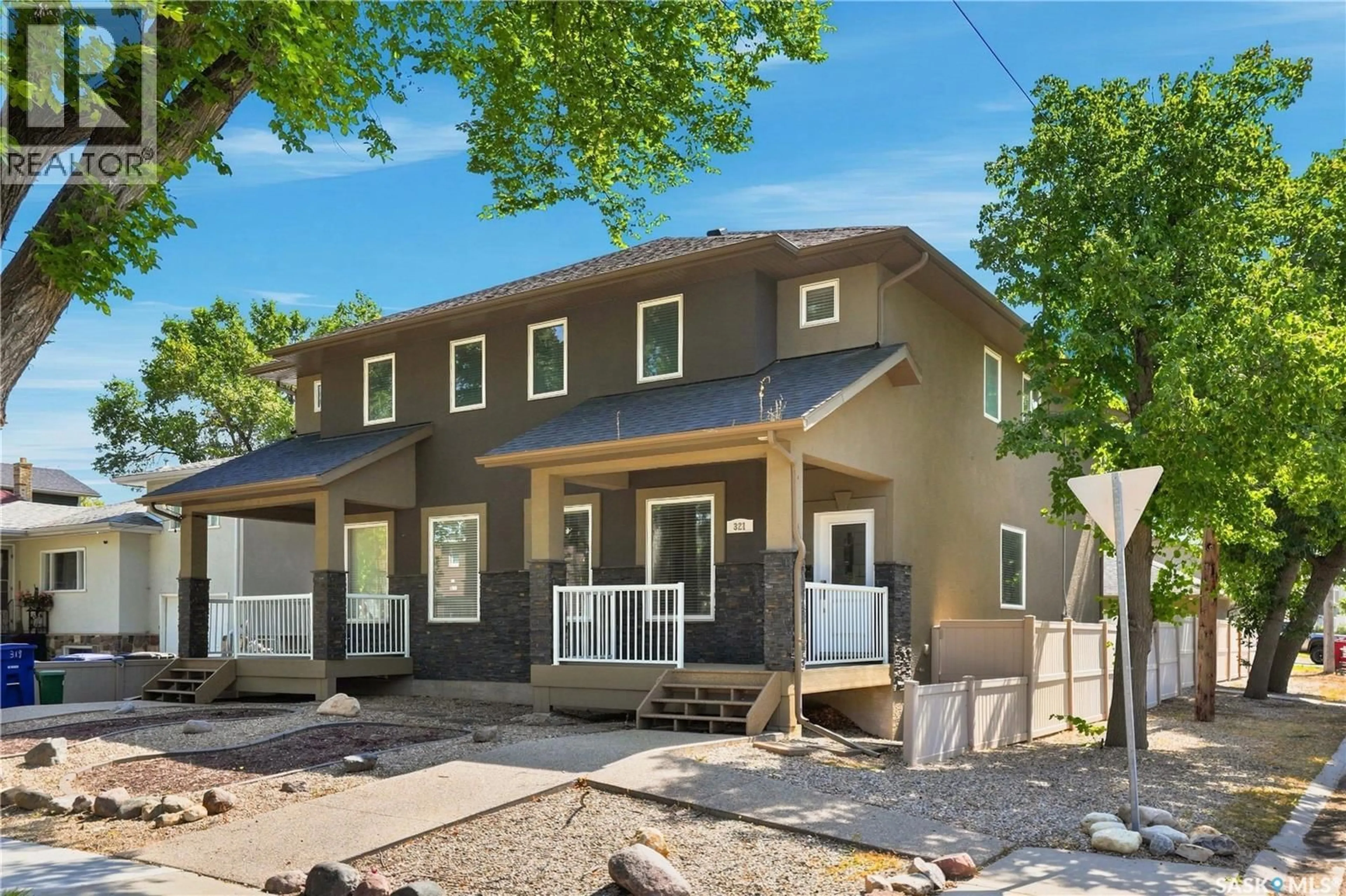 Home with vinyl exterior material, street for 321 110TH STREET, Saskatoon Saskatchewan S7N1S4