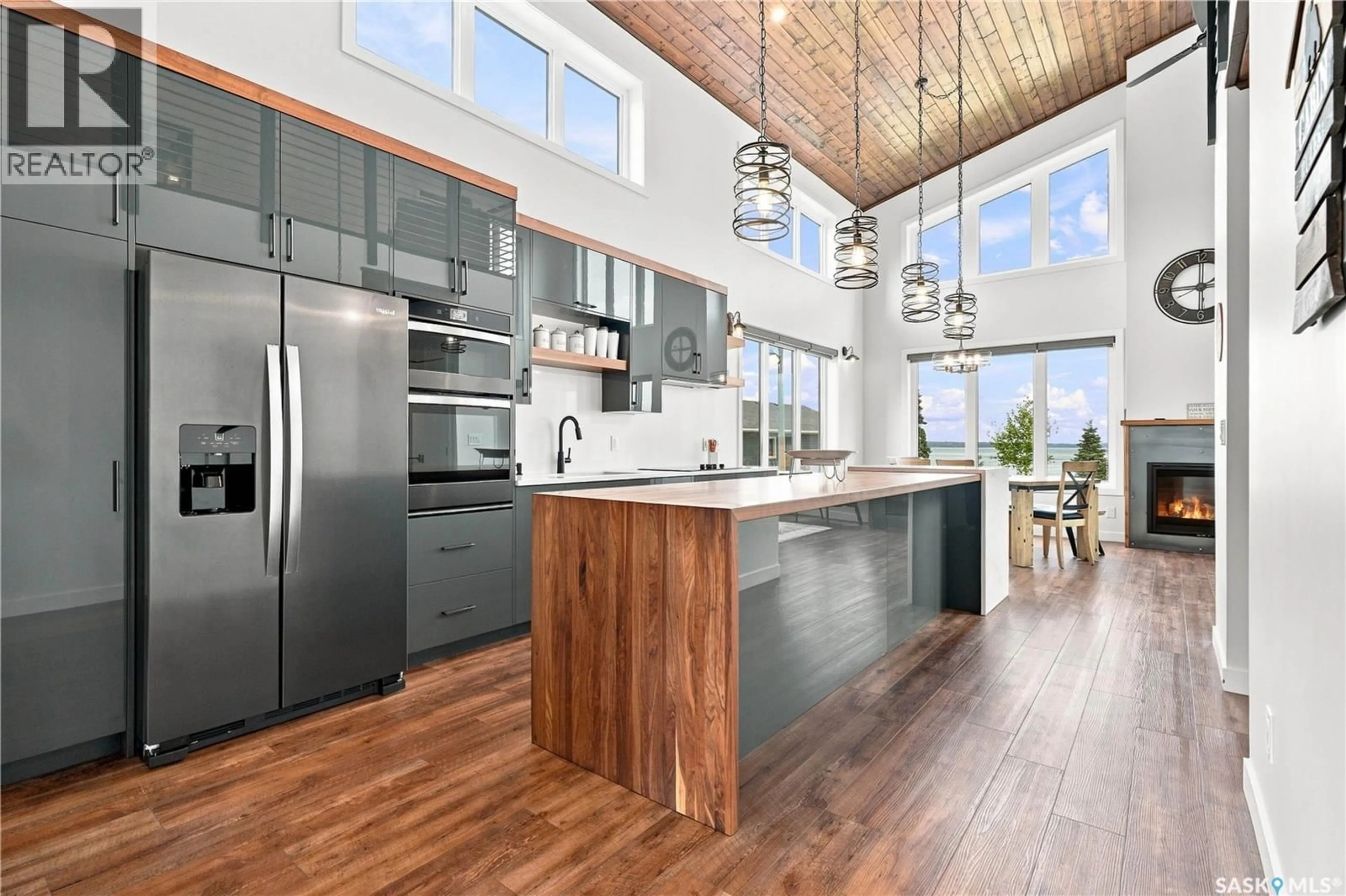 Open concept kitchen, wood/laminate floor for 5000 LAKESIDE ROAD, Marean Lake Saskatchewan S0E0E0