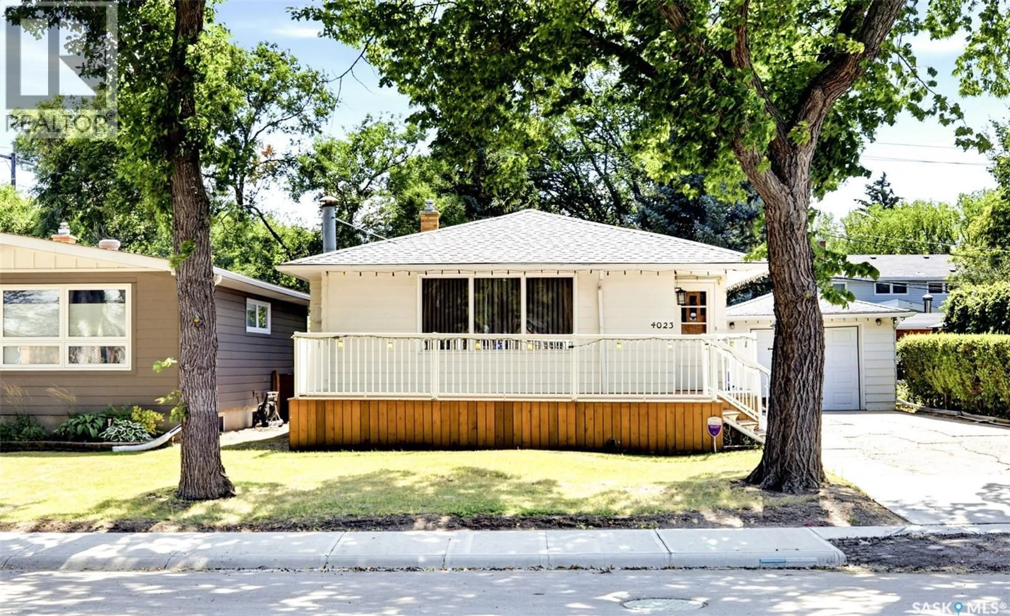 Home with vinyl exterior material, street for 4023 MCPHAIL AVENUE, Regina Saskatchewan S4S1G1