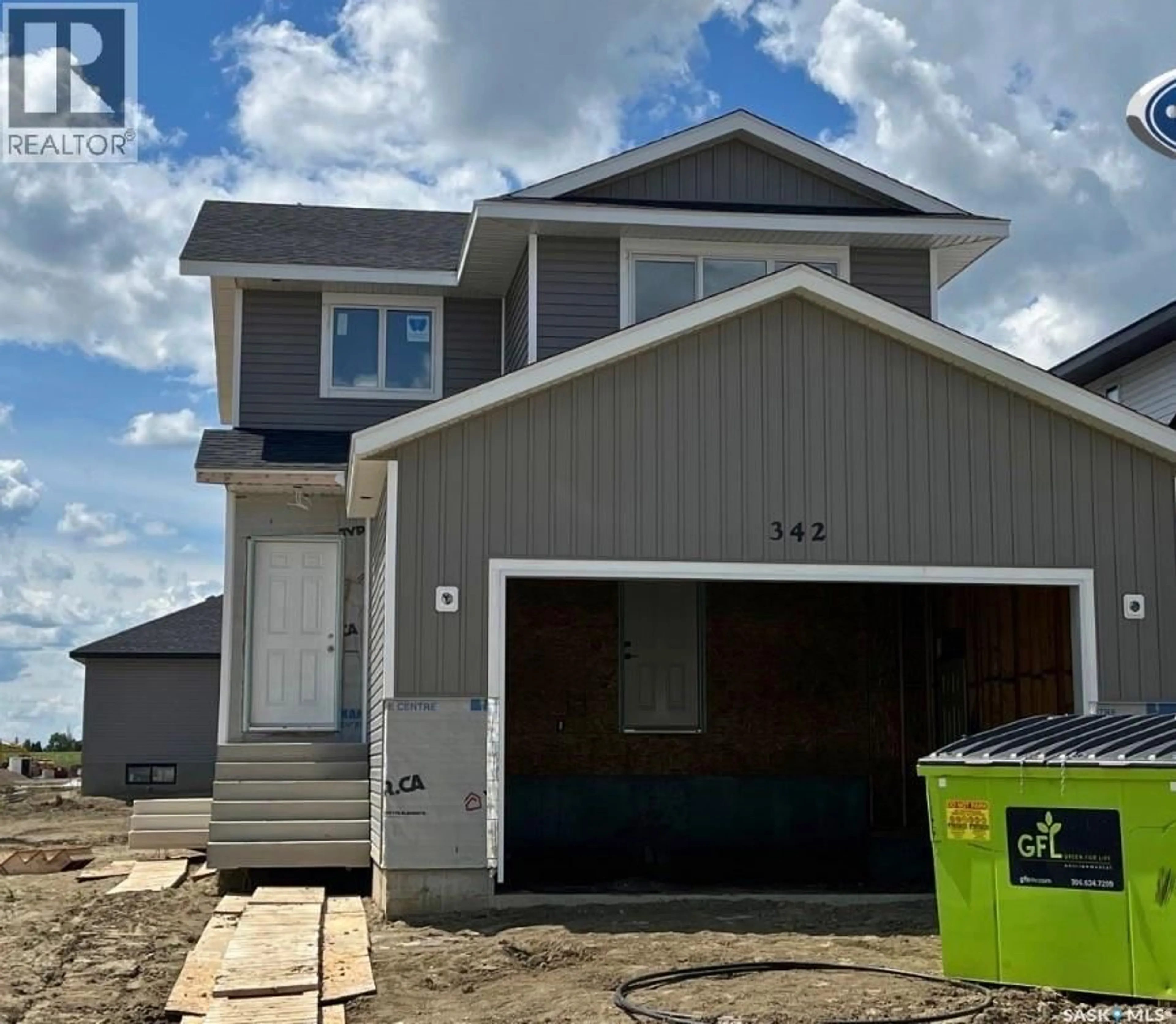 Home with vinyl exterior material, street for 342 TRAEGER CLOSE, Saskatoon Saskatchewan S7V0T9
