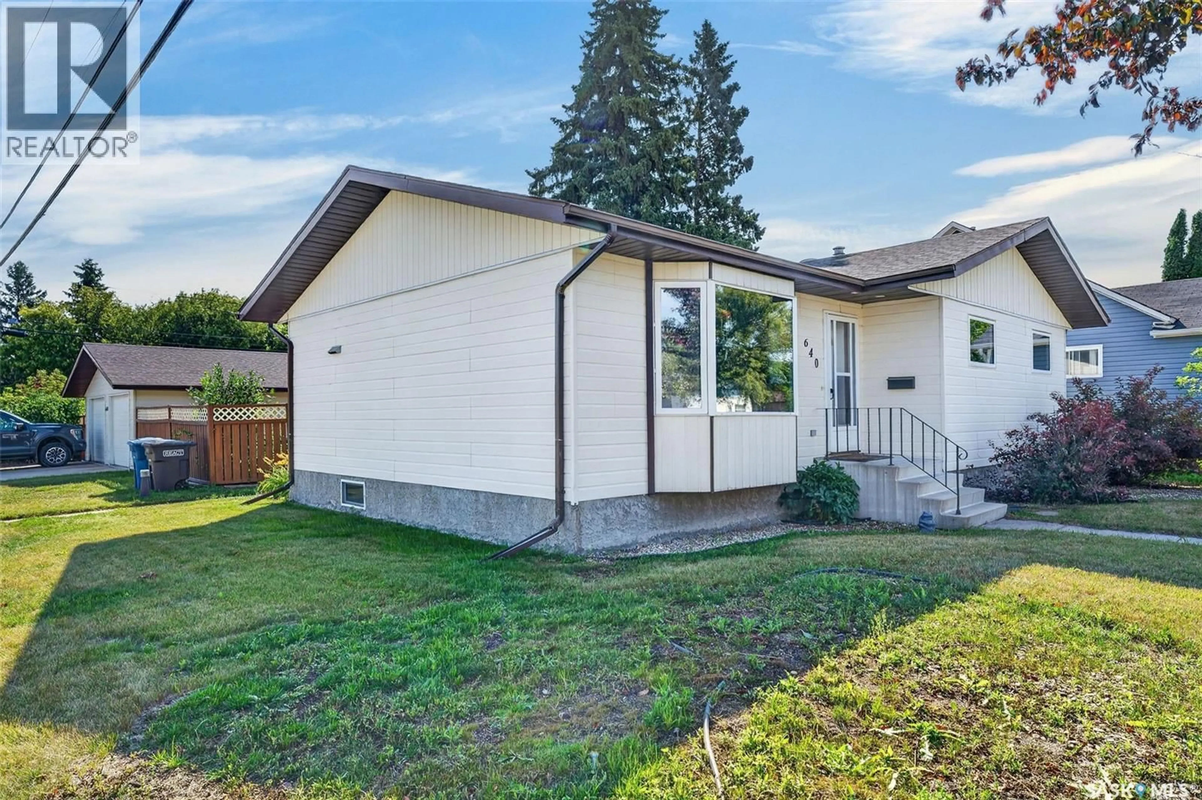 Home with vinyl exterior material, street for 640 13TH STREET, Humboldt Saskatchewan S0K2A0