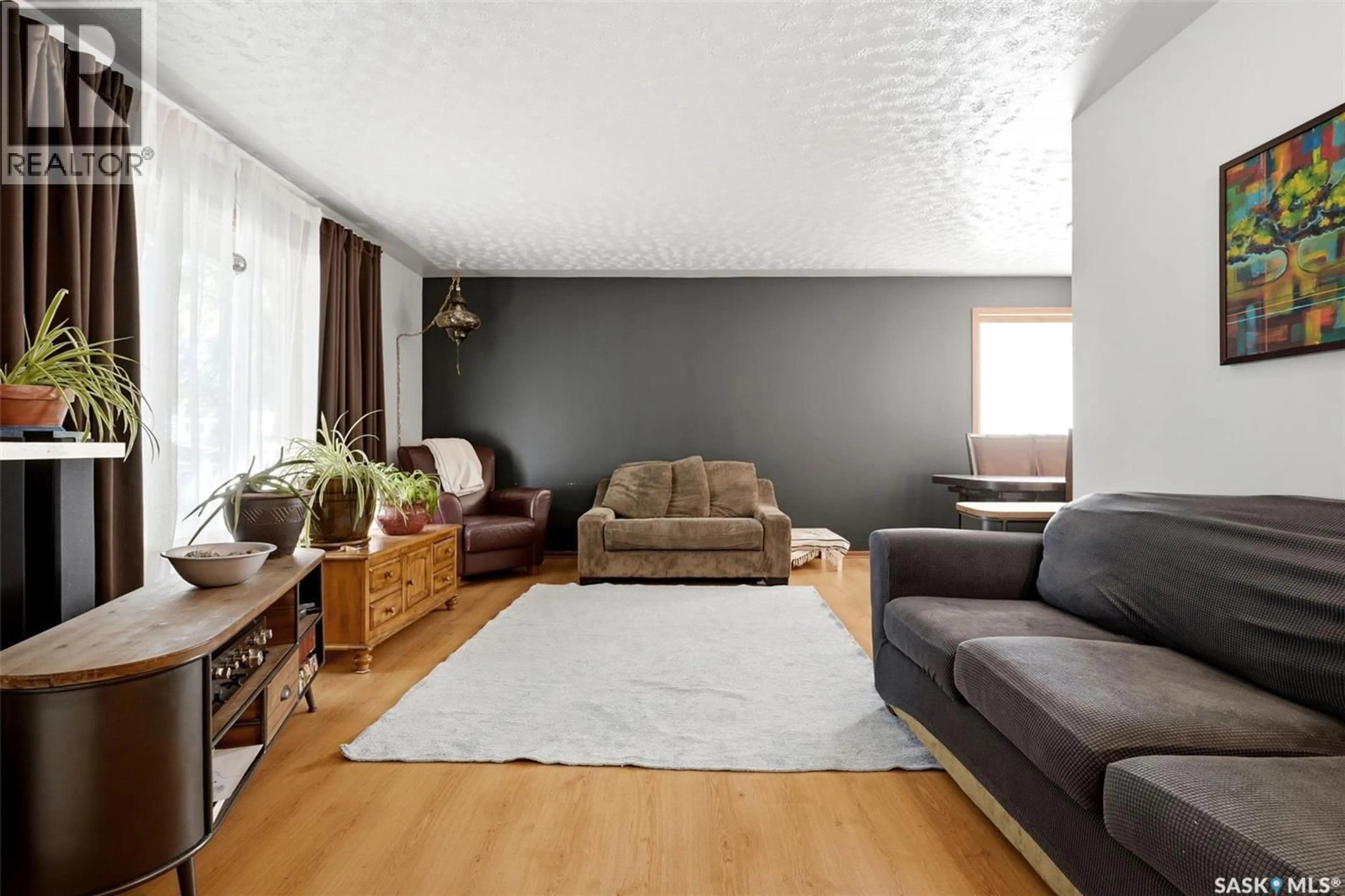 Living room with furniture, unknown for 3210 PARLIAMENT AVENUE, Regina Saskatchewan S4S2L8