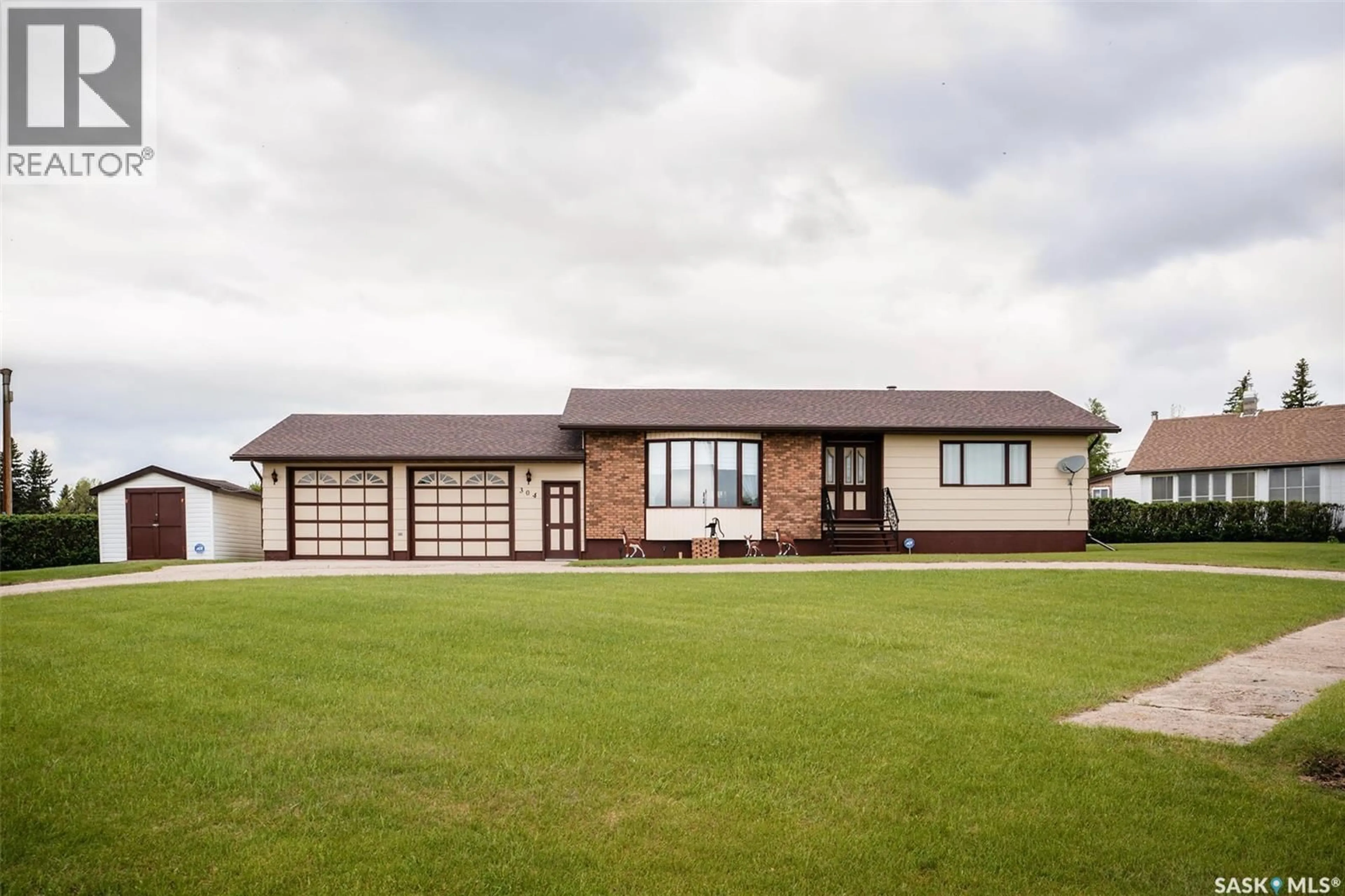 A pic from outside/outdoor area/front of a property/back of a property/a pic from drone, building for 304 PIERSON STREET, Neudorf Saskatchewan S0A2T0