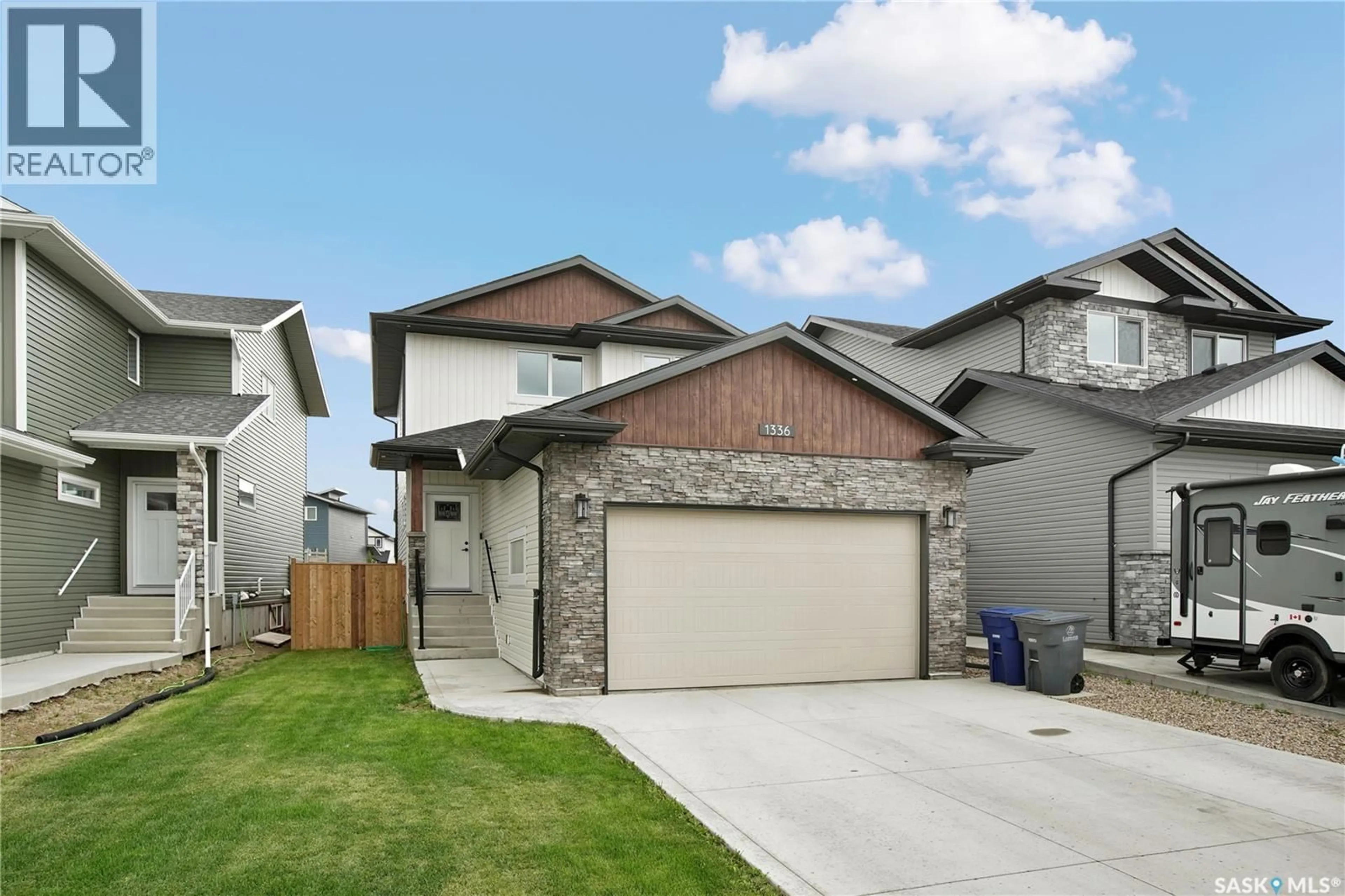 Home with vinyl exterior material, street for 1334 PARR HILL DRIVE, Martensville Saskatchewan S0K2T1